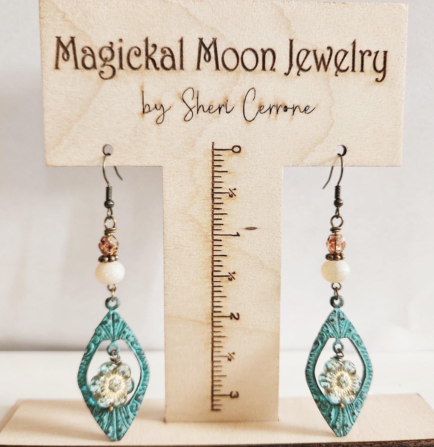 Gold ornate beaded dangle earrings