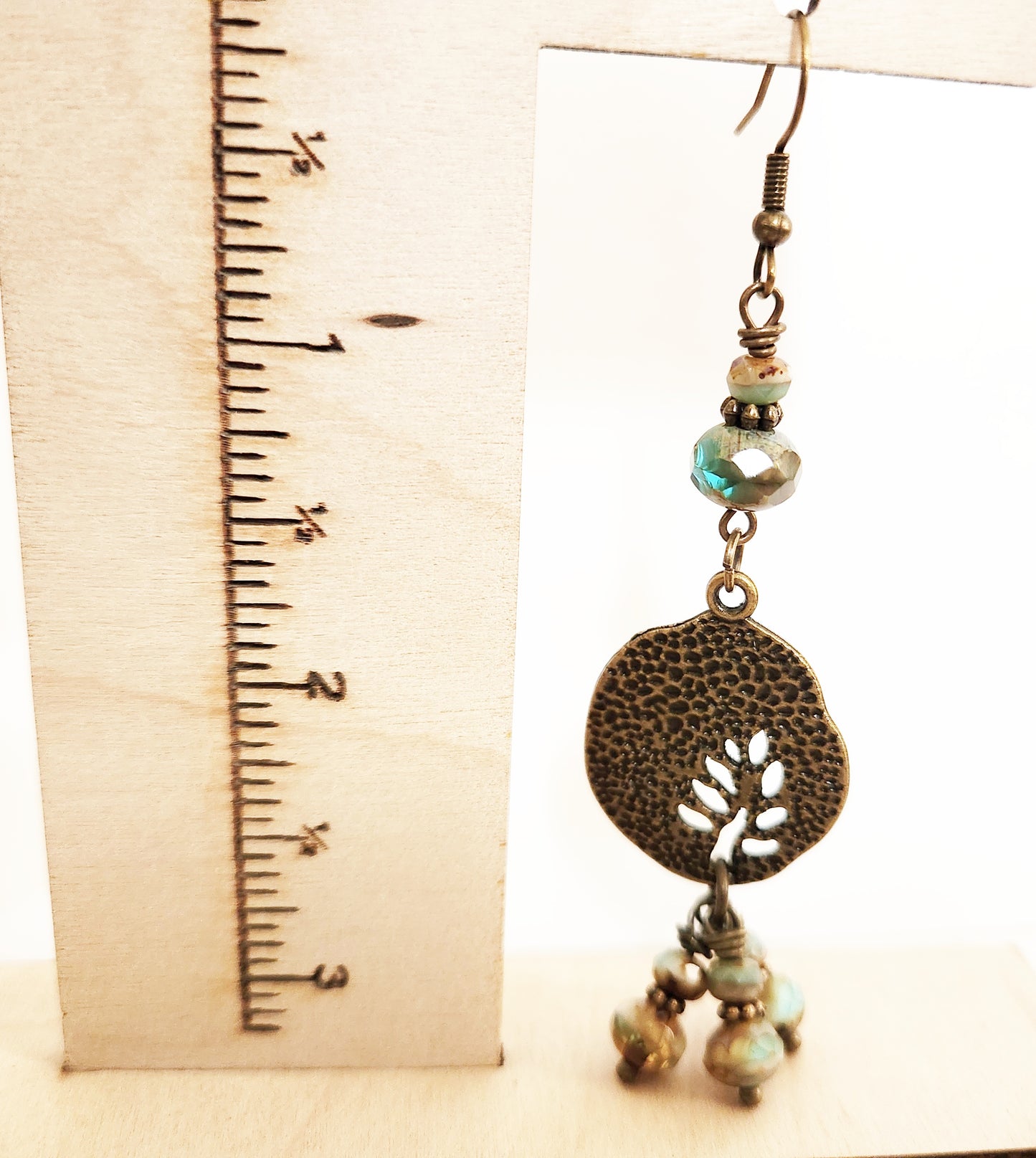 Brushed gold beaded charm dangle leaf earrings