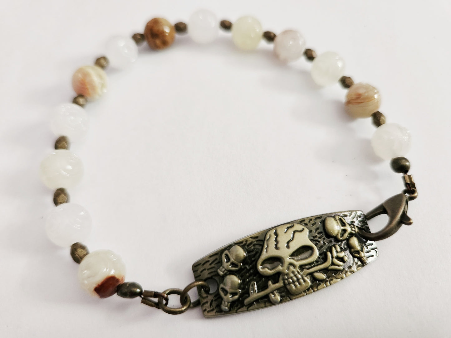 Dark gold skull gemstone bracelet