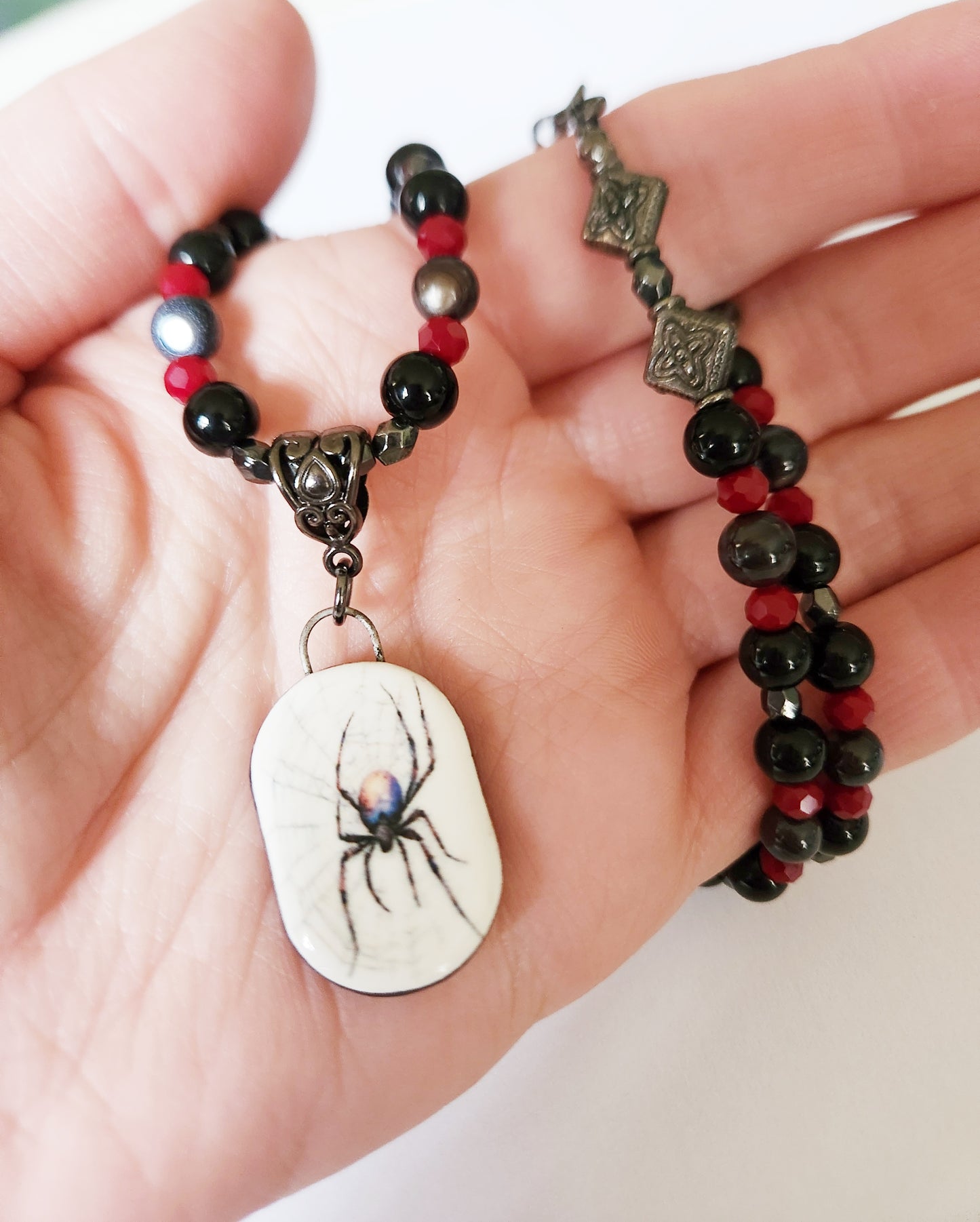 Dark silver spider gemstone necklace