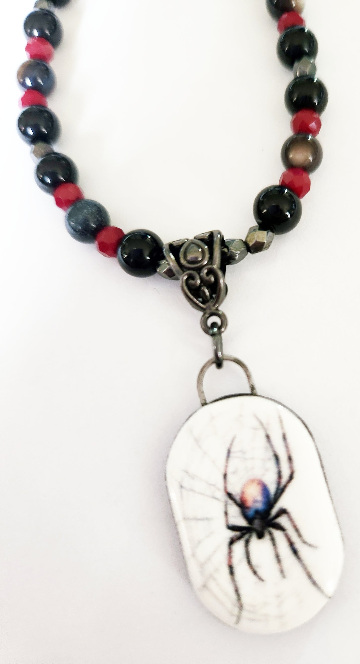 Dark silver spider gemstone necklace