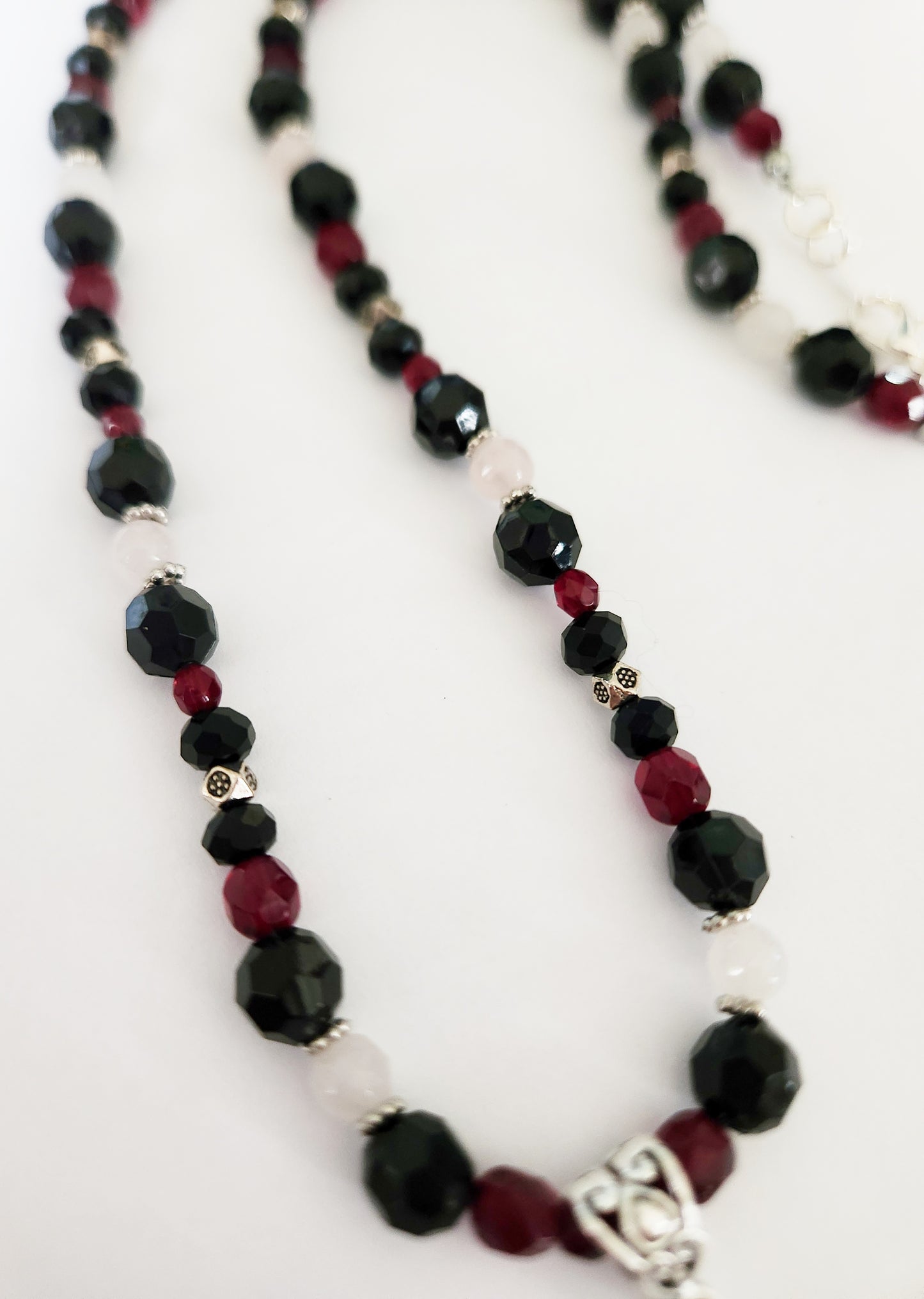 Silver skeleton hand Rose Quartz gemstone necklace