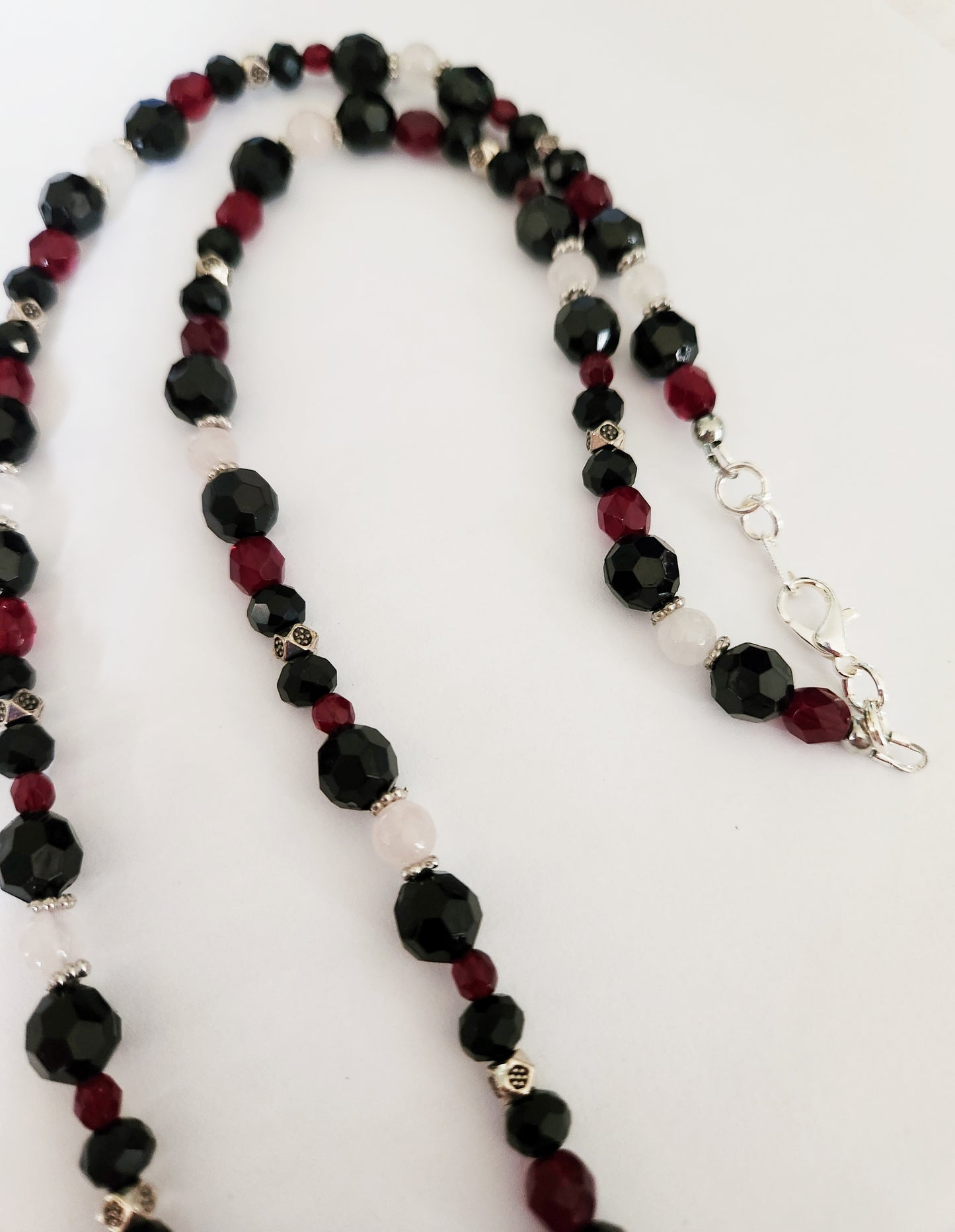 Silver skeleton hand Rose Quartz gemstone necklace