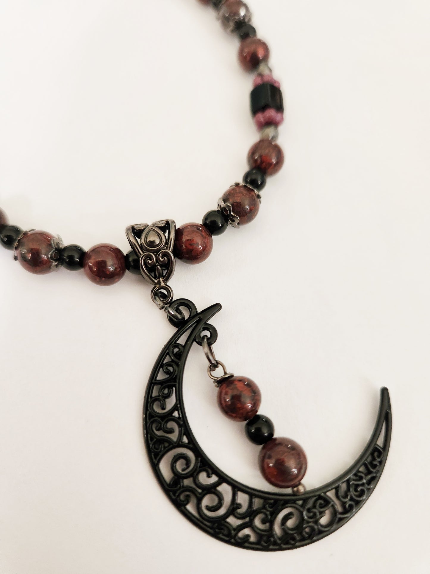 Black crescent moon gemstone necklace