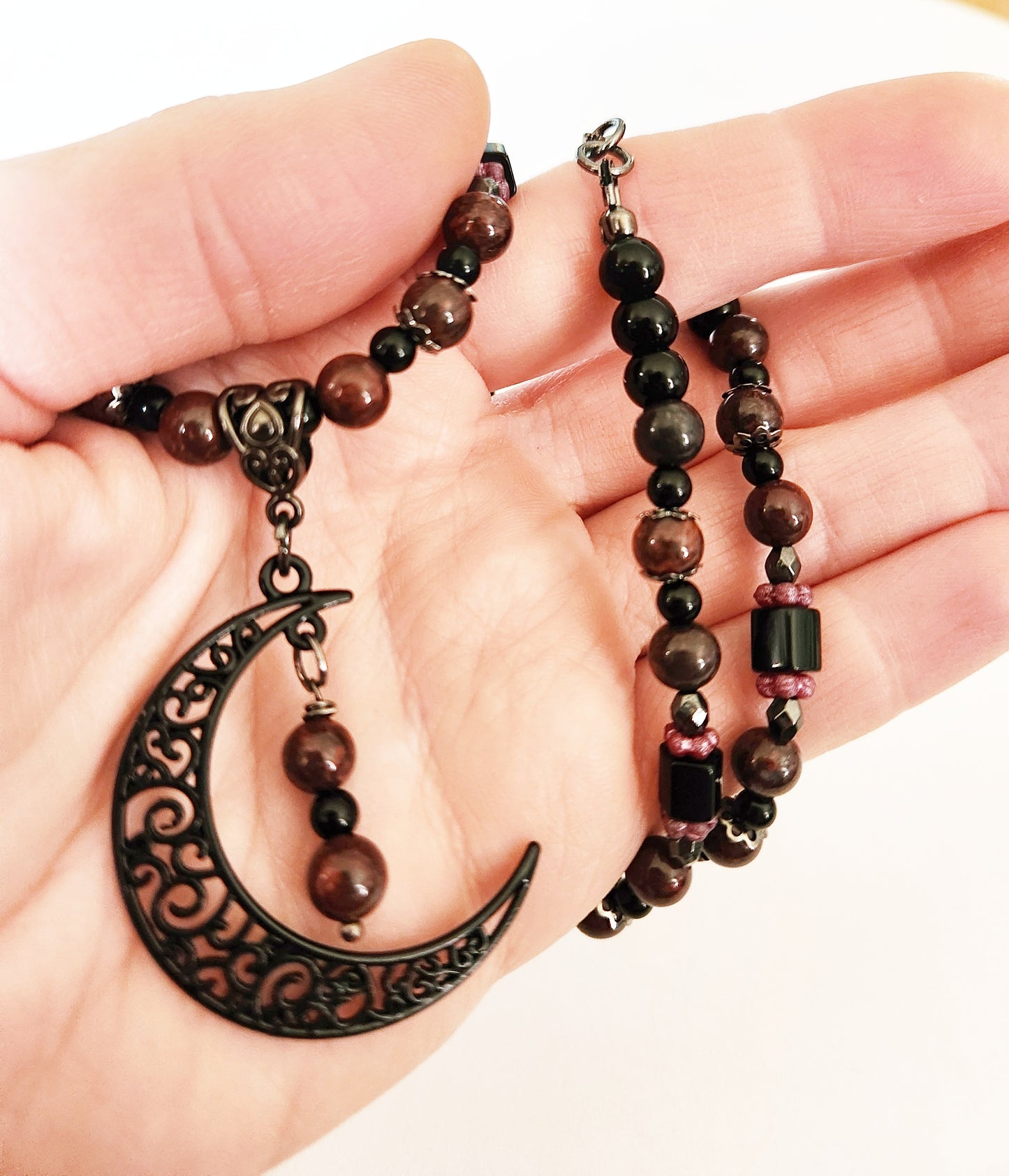 Black crescent moon gemstone necklace