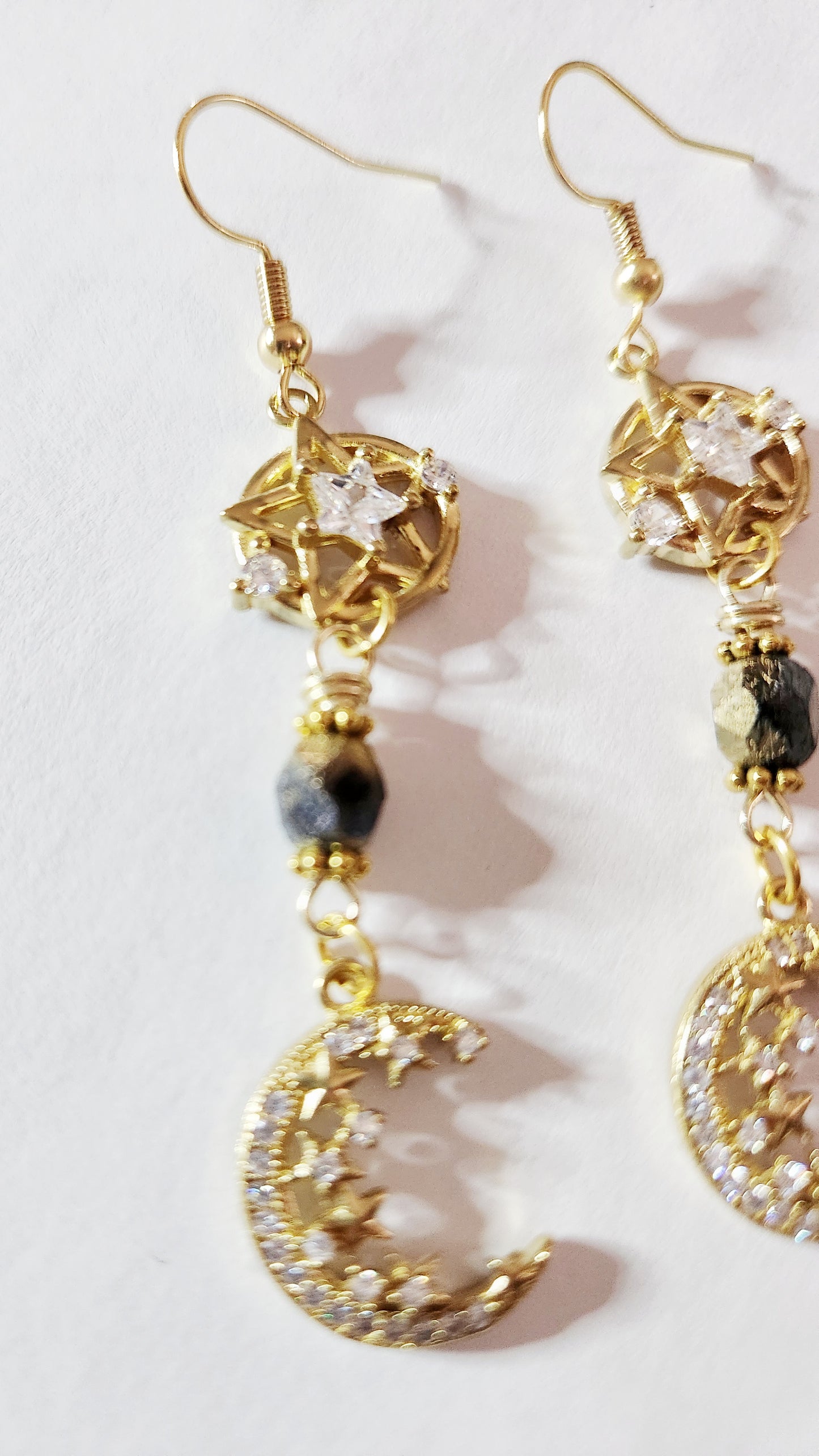 Gold crescent moon dangle earrings