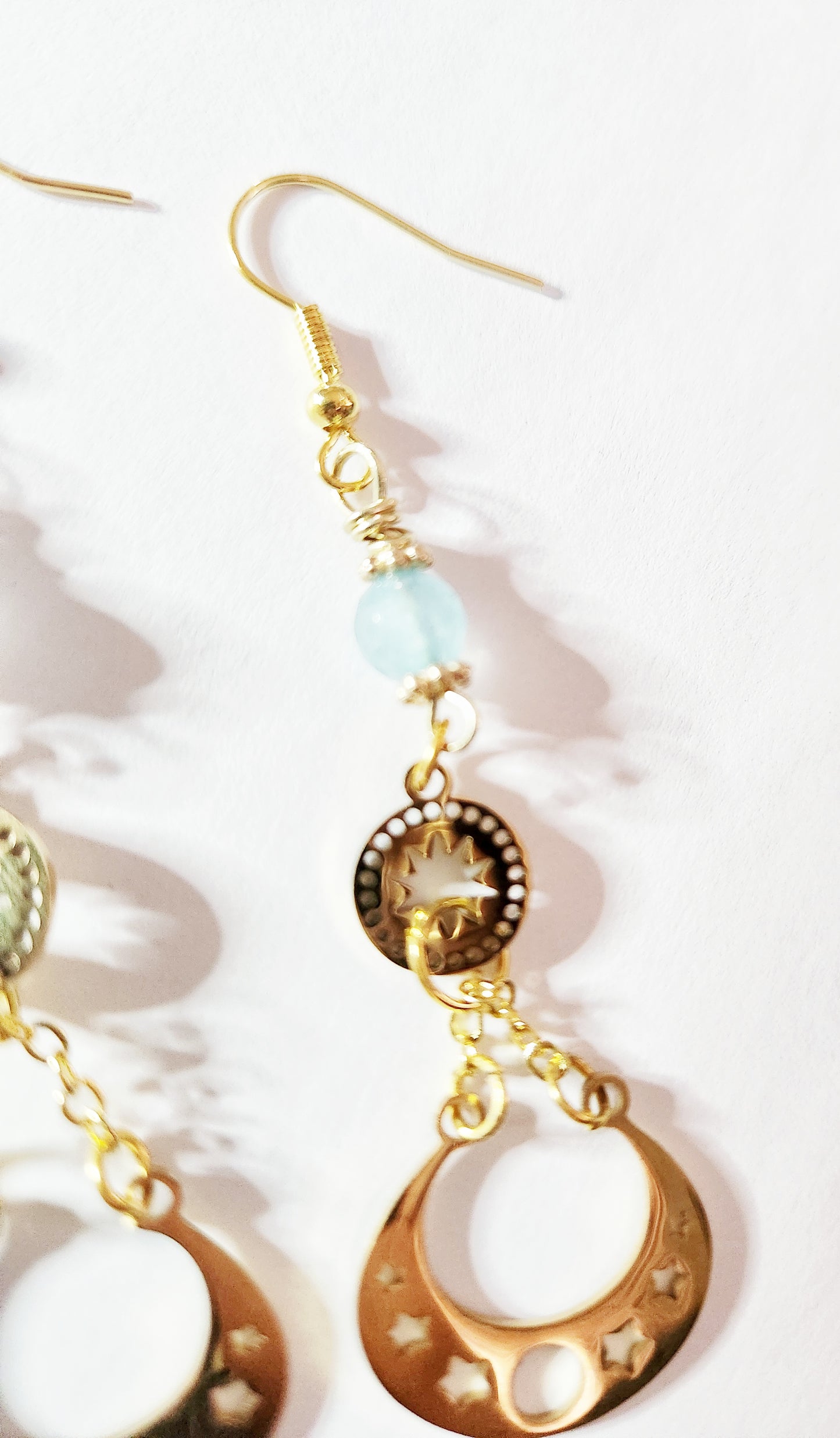 Gold moon phase dangle earrings