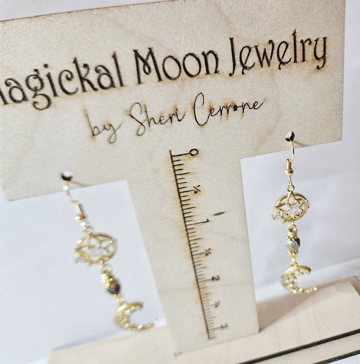 Gold crescent moon dangle earrings