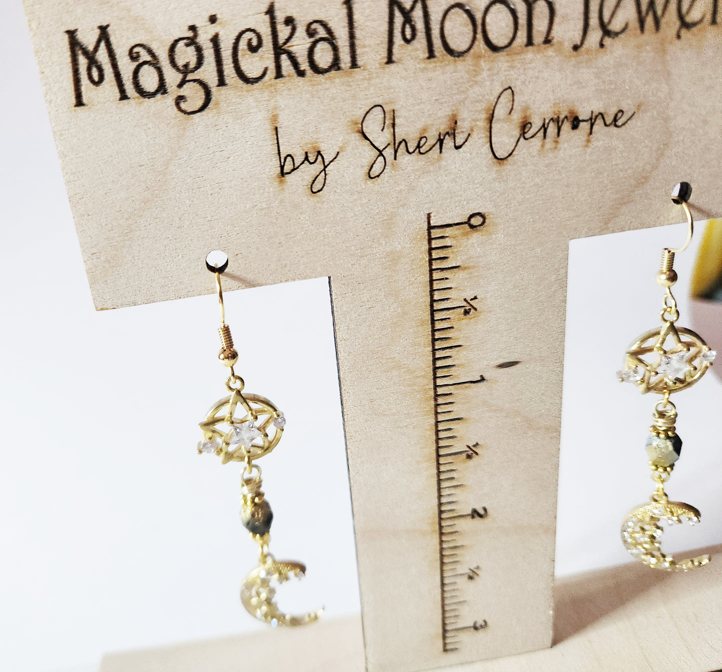 Gold crescent moon dangle earrings