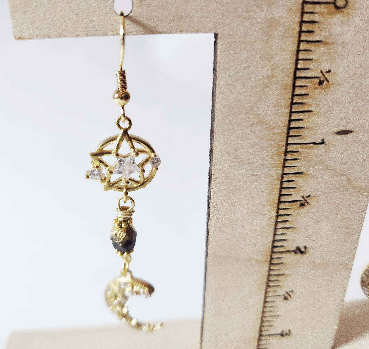 Gold crescent moon dangle earrings