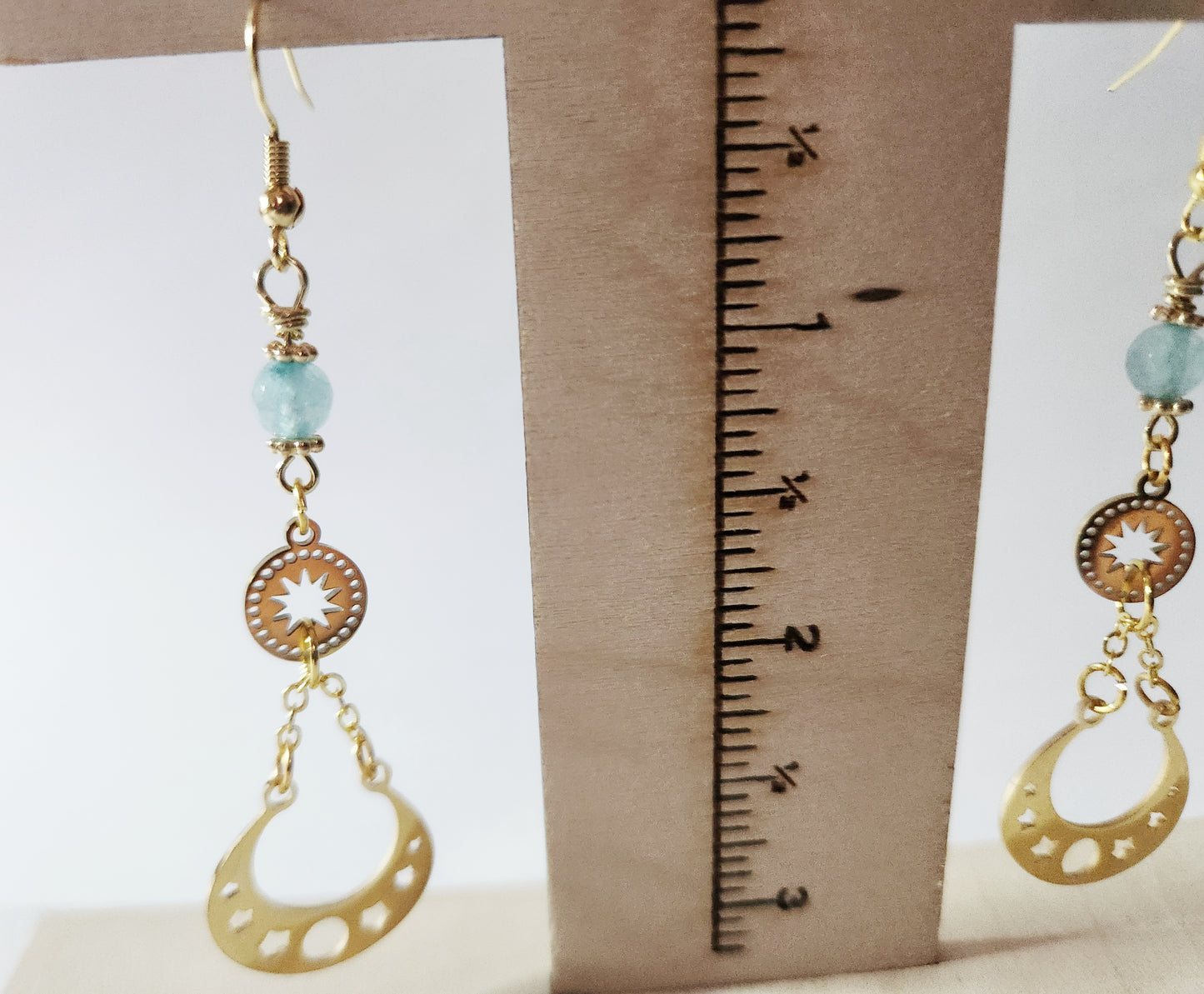 Gold moon phase dangle earrings