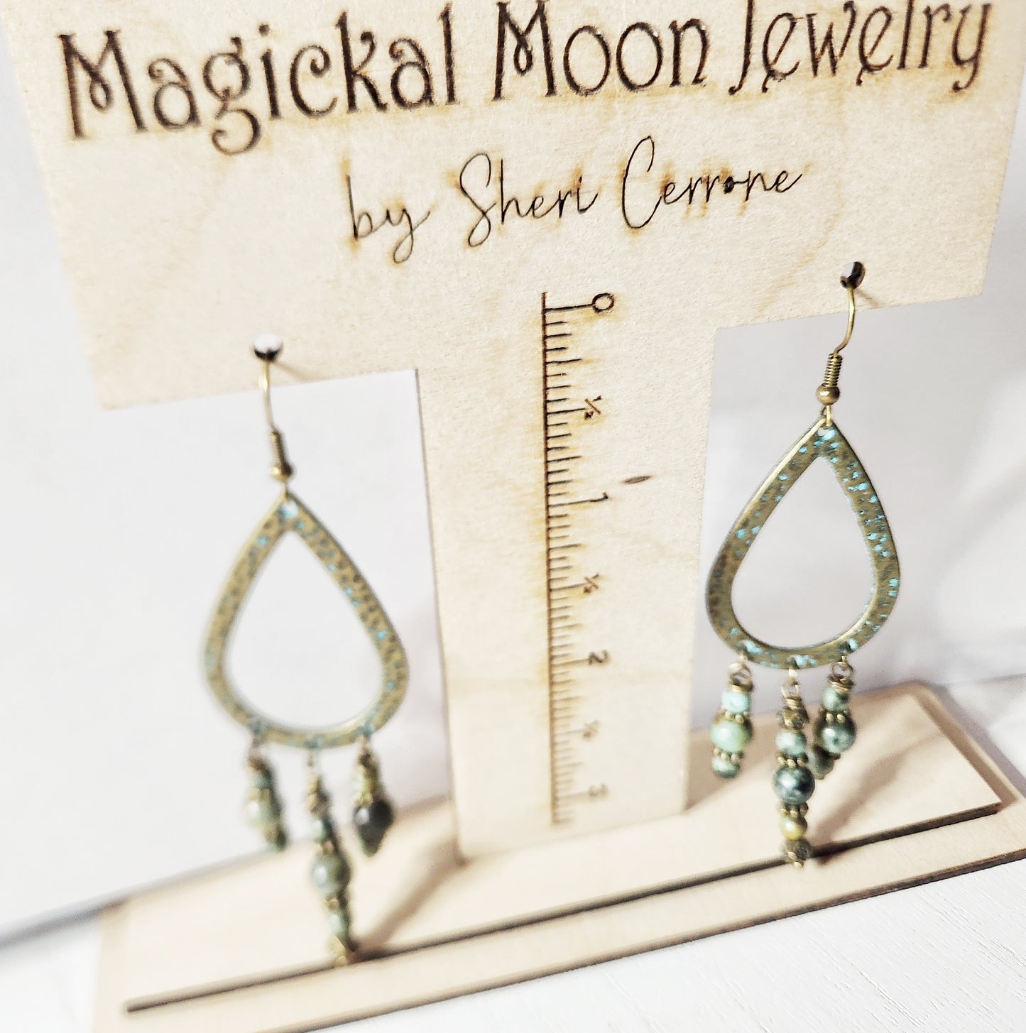 Brushed gold teardrop dangle earrings
