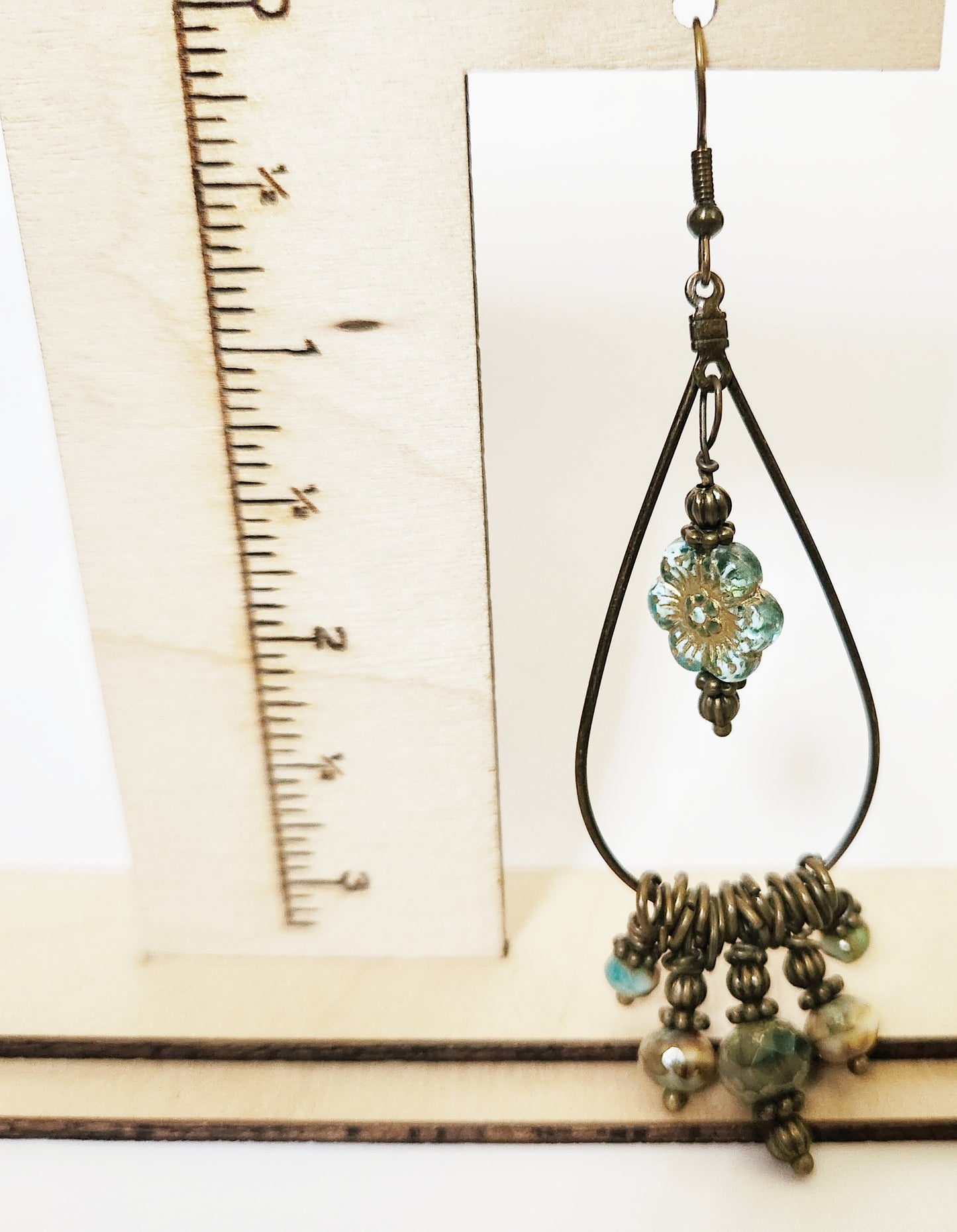 Brushed gold beaded charm dangle statement earrings