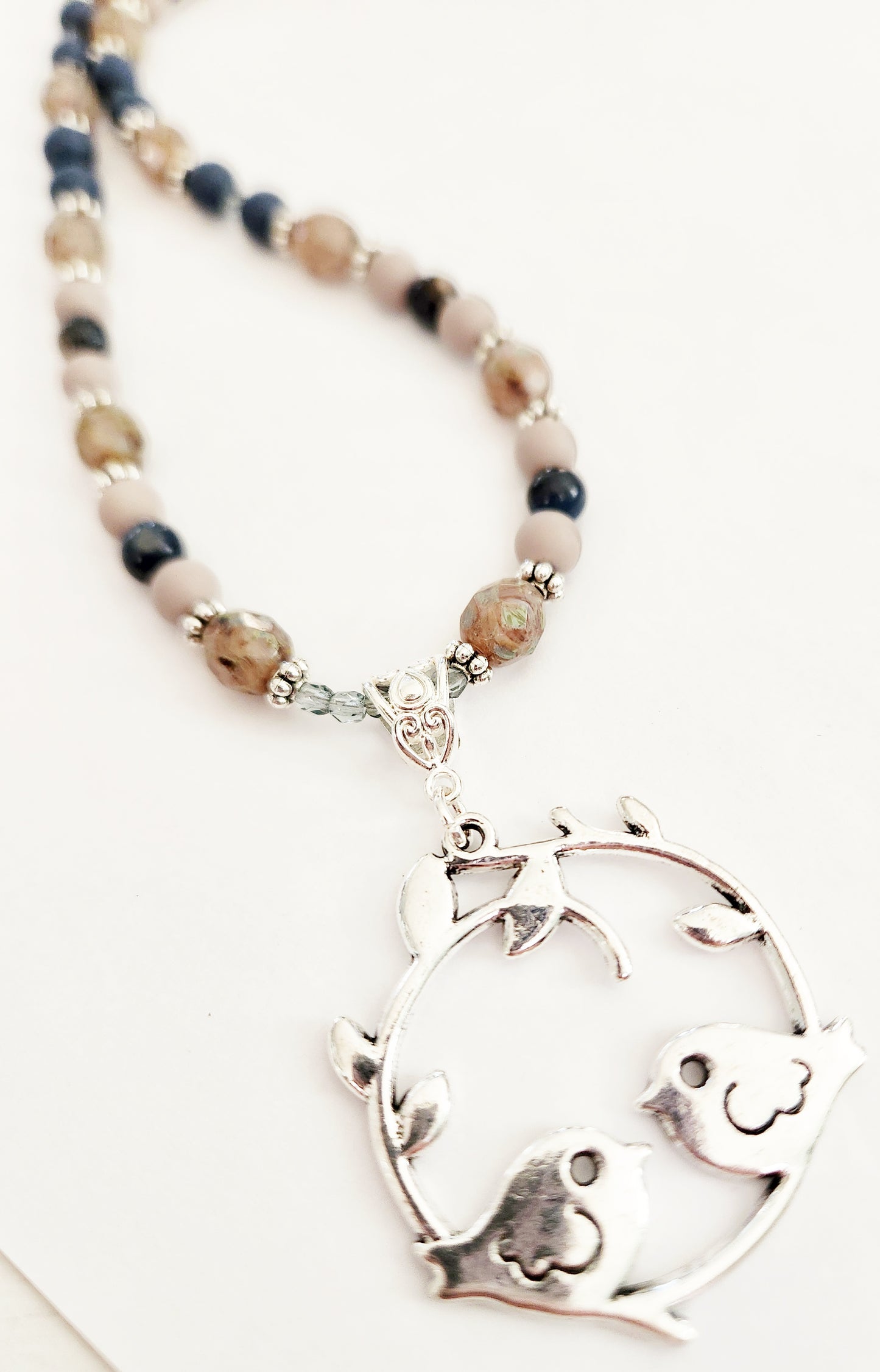 Silver bird mother of pearl necklace