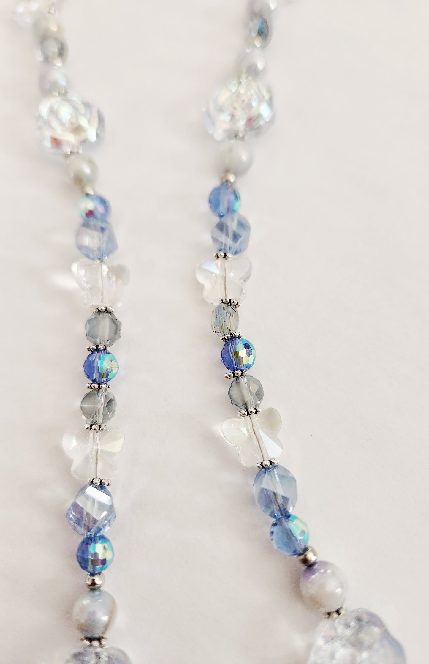 Silver rose and blue whimsical gemstone necklace