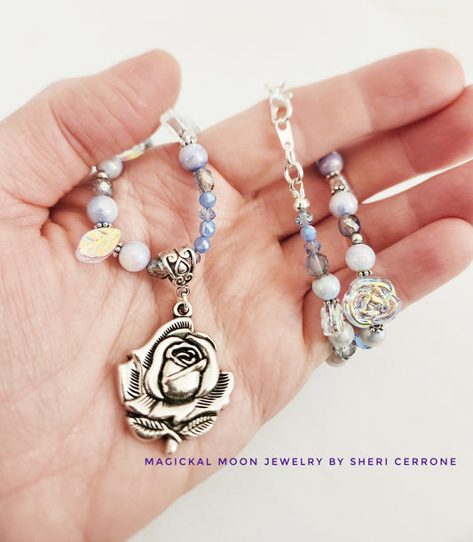 Silver rose and blue whimsical gemstone necklace