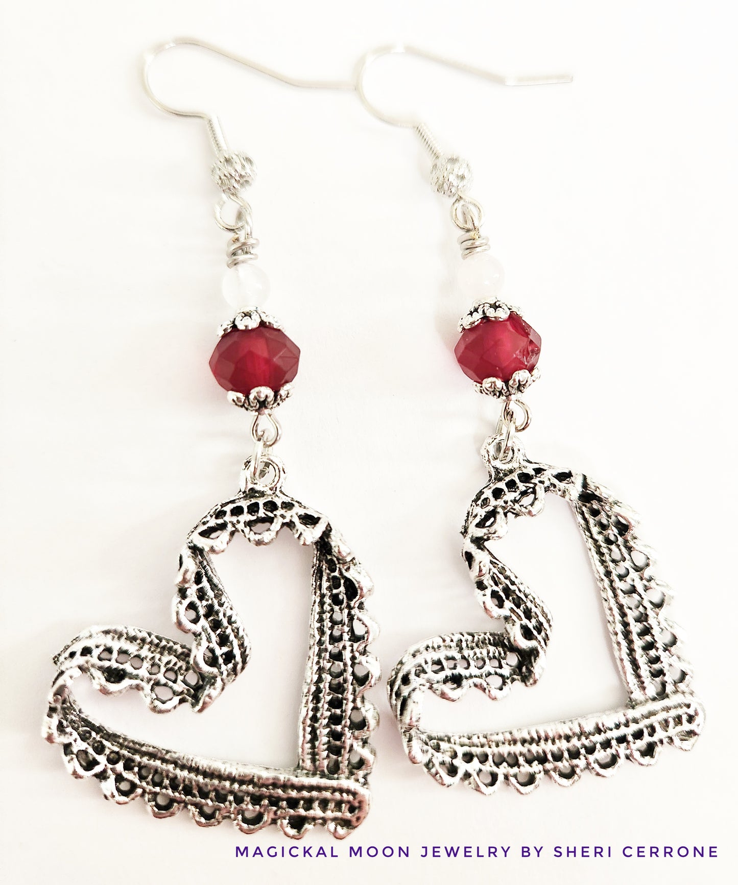 Silver ribbon heart dangle earrings