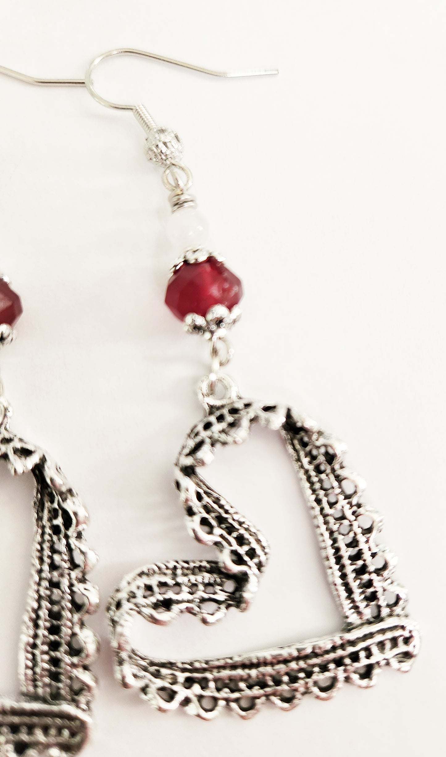 Silver ribbon heart dangle earrings