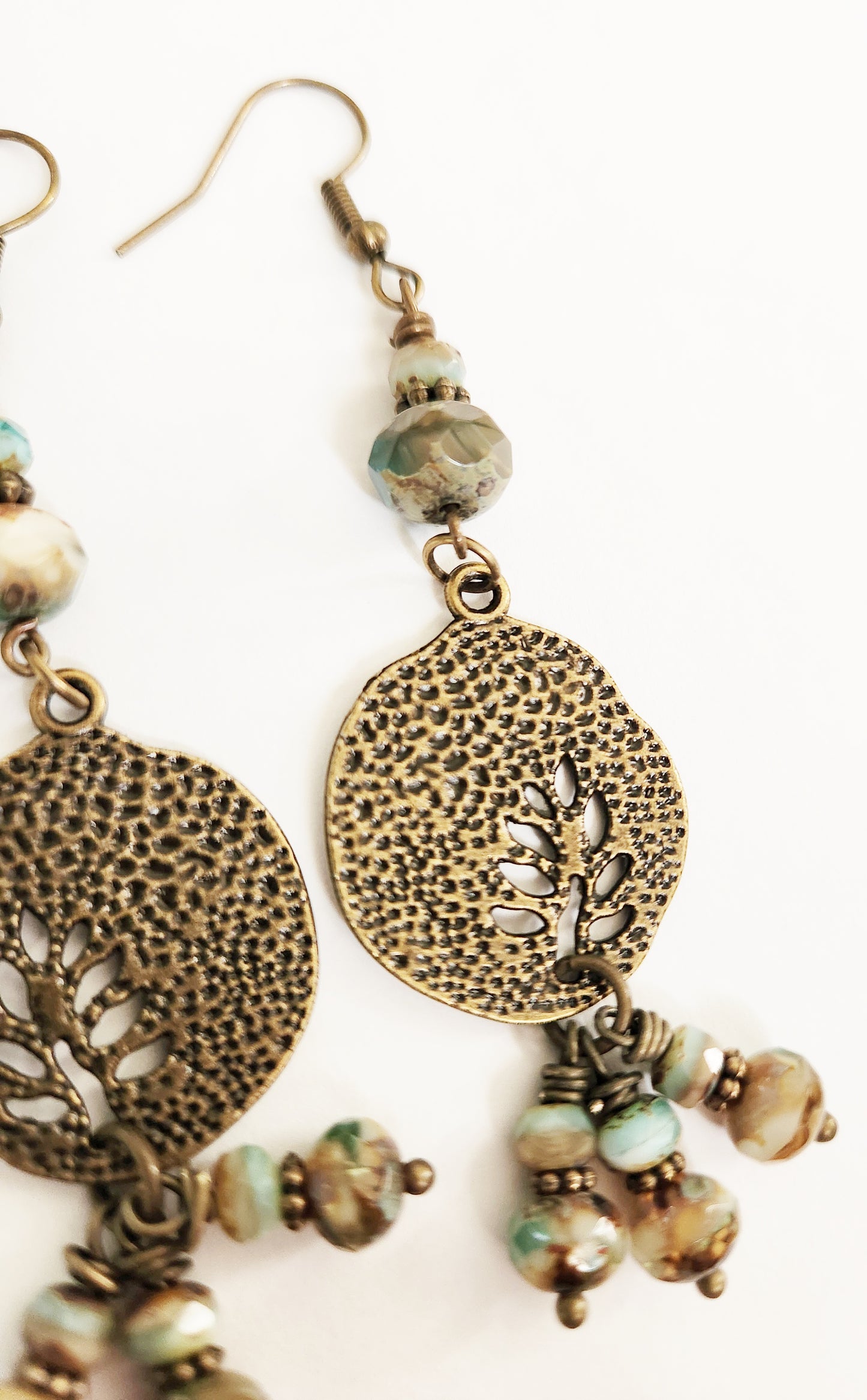 Brushed gold beaded charm dangle leaf earrings