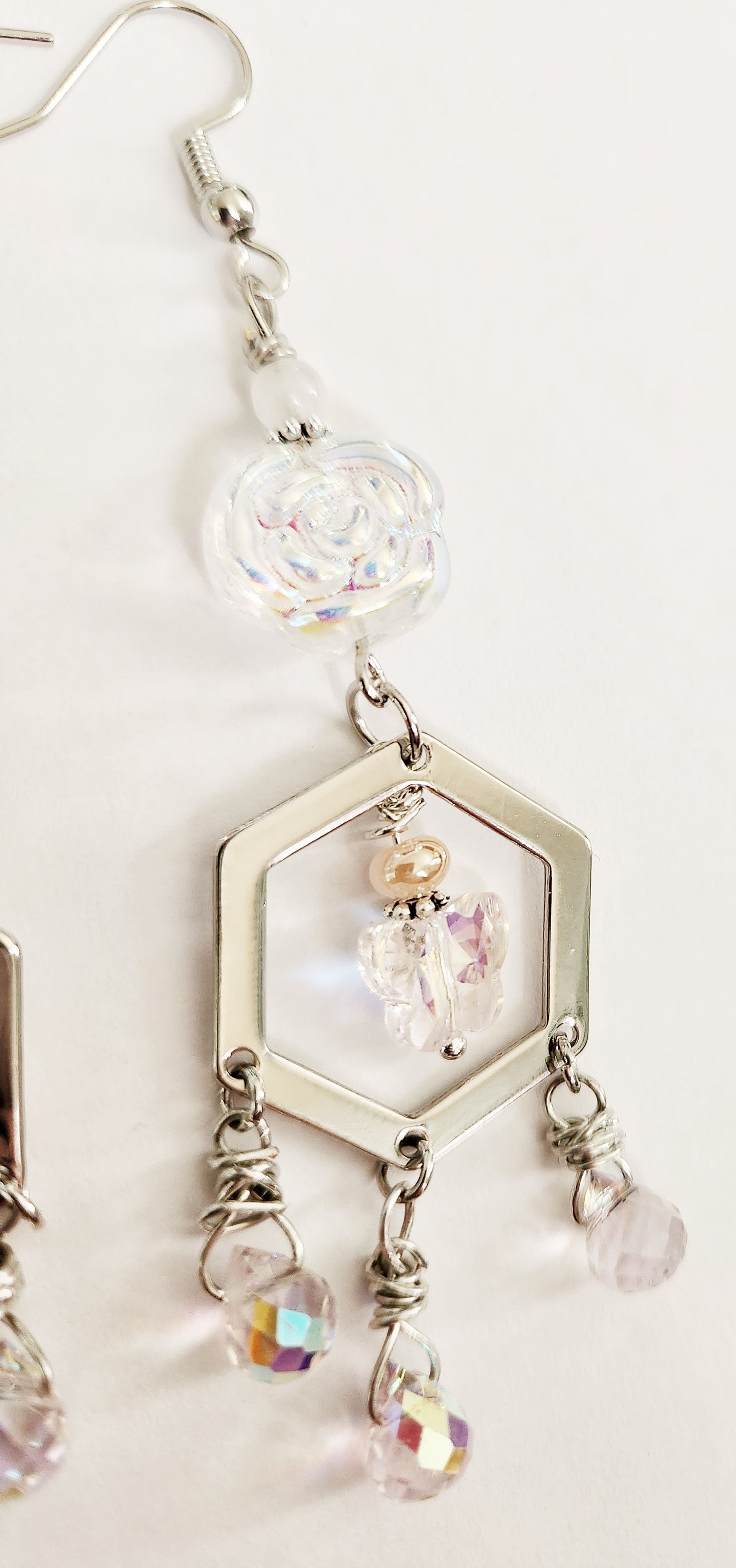 Iridescent rose and butterfly silver dangle earrings