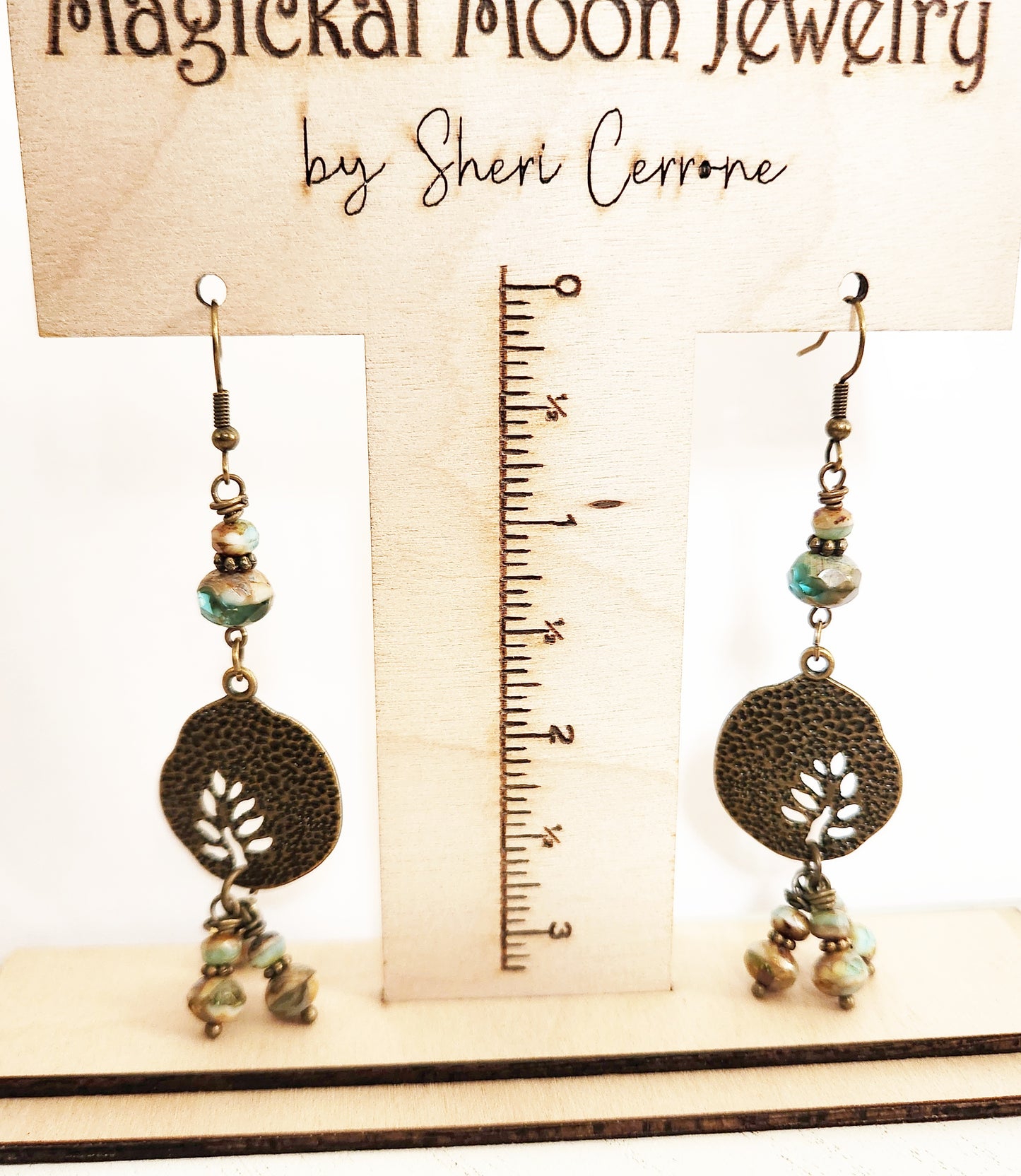 Brushed gold beaded charm dangle leaf earrings