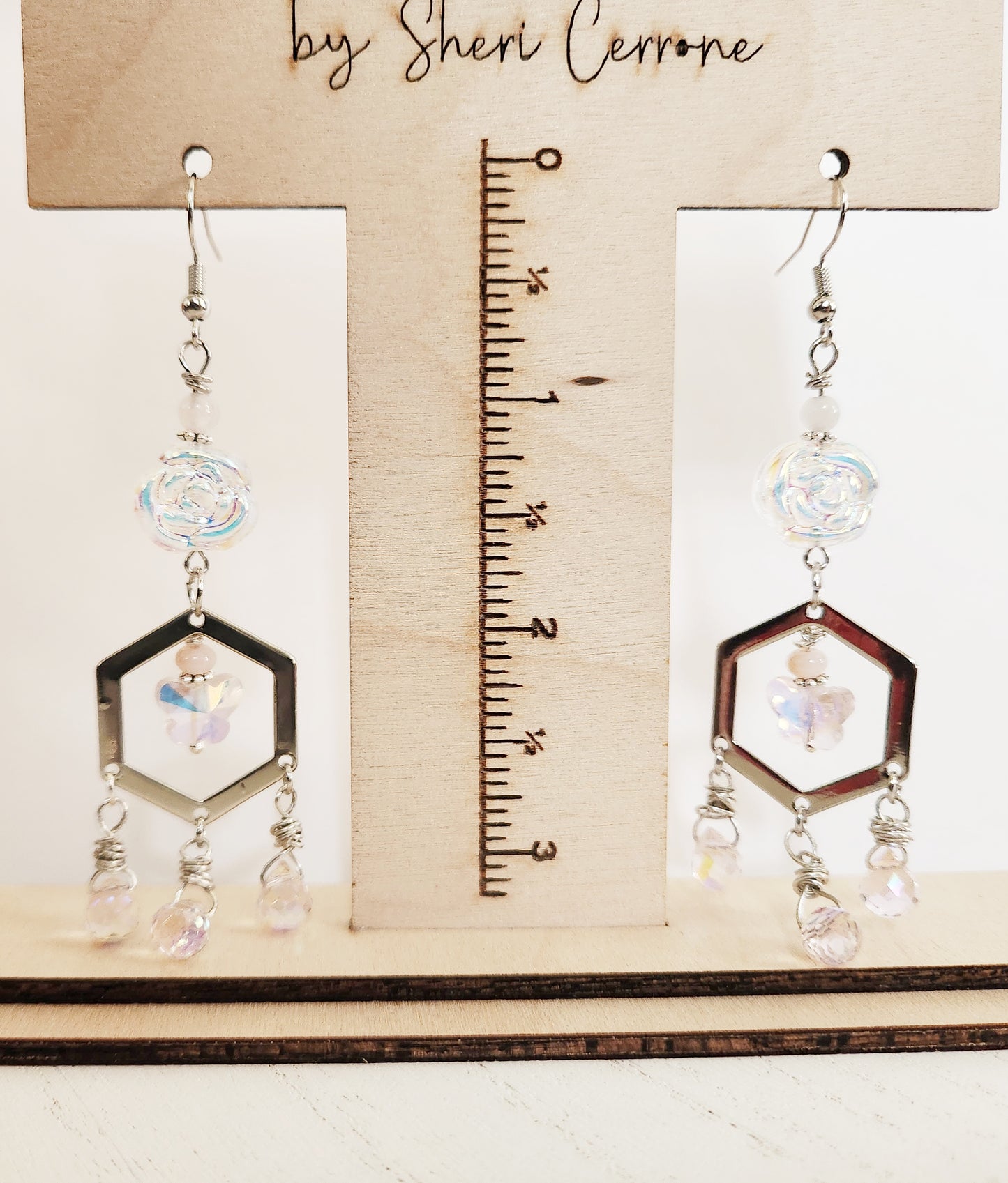 Iridescent rose and butterfly silver dangle earrings