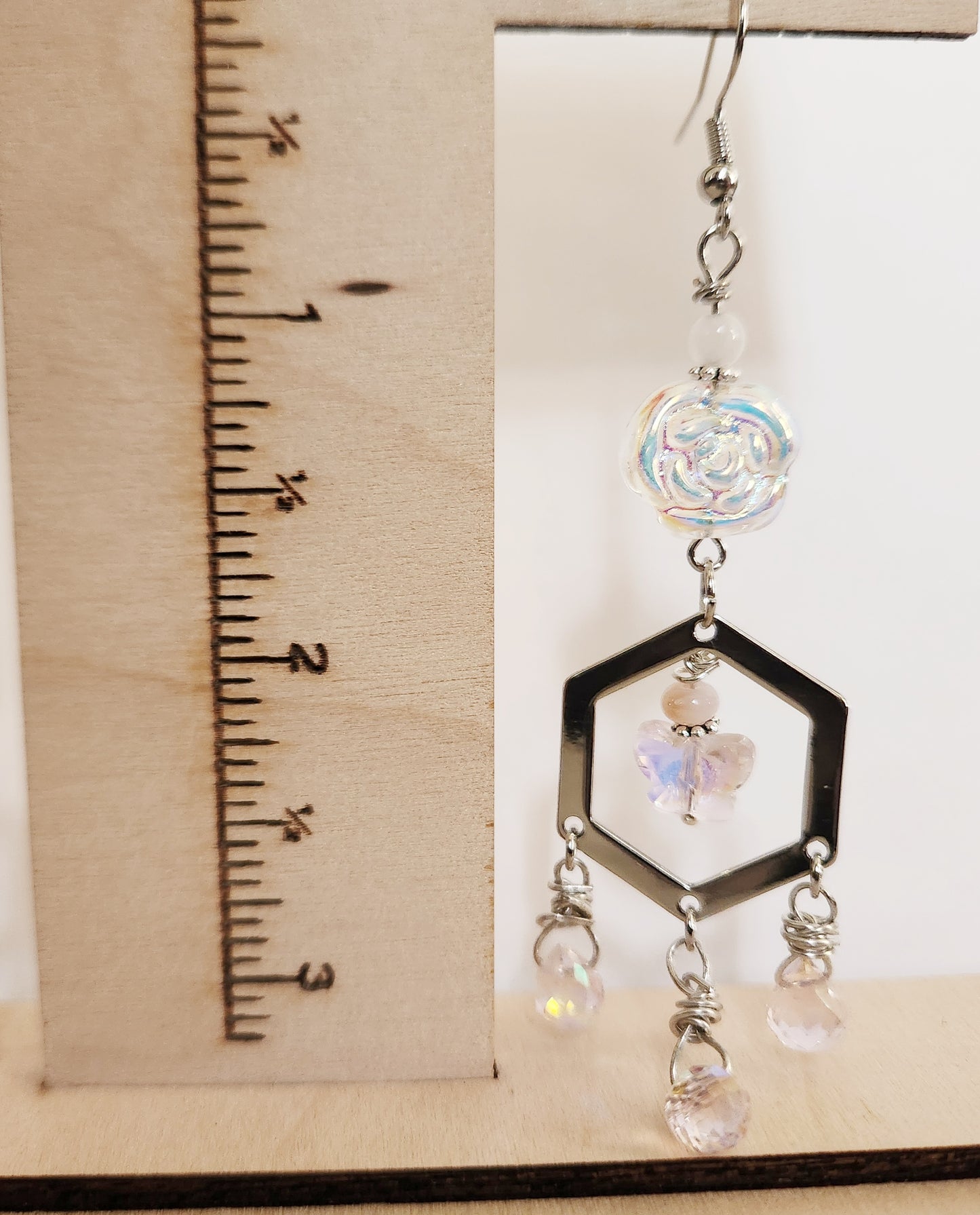 Iridescent rose and butterfly silver dangle earrings