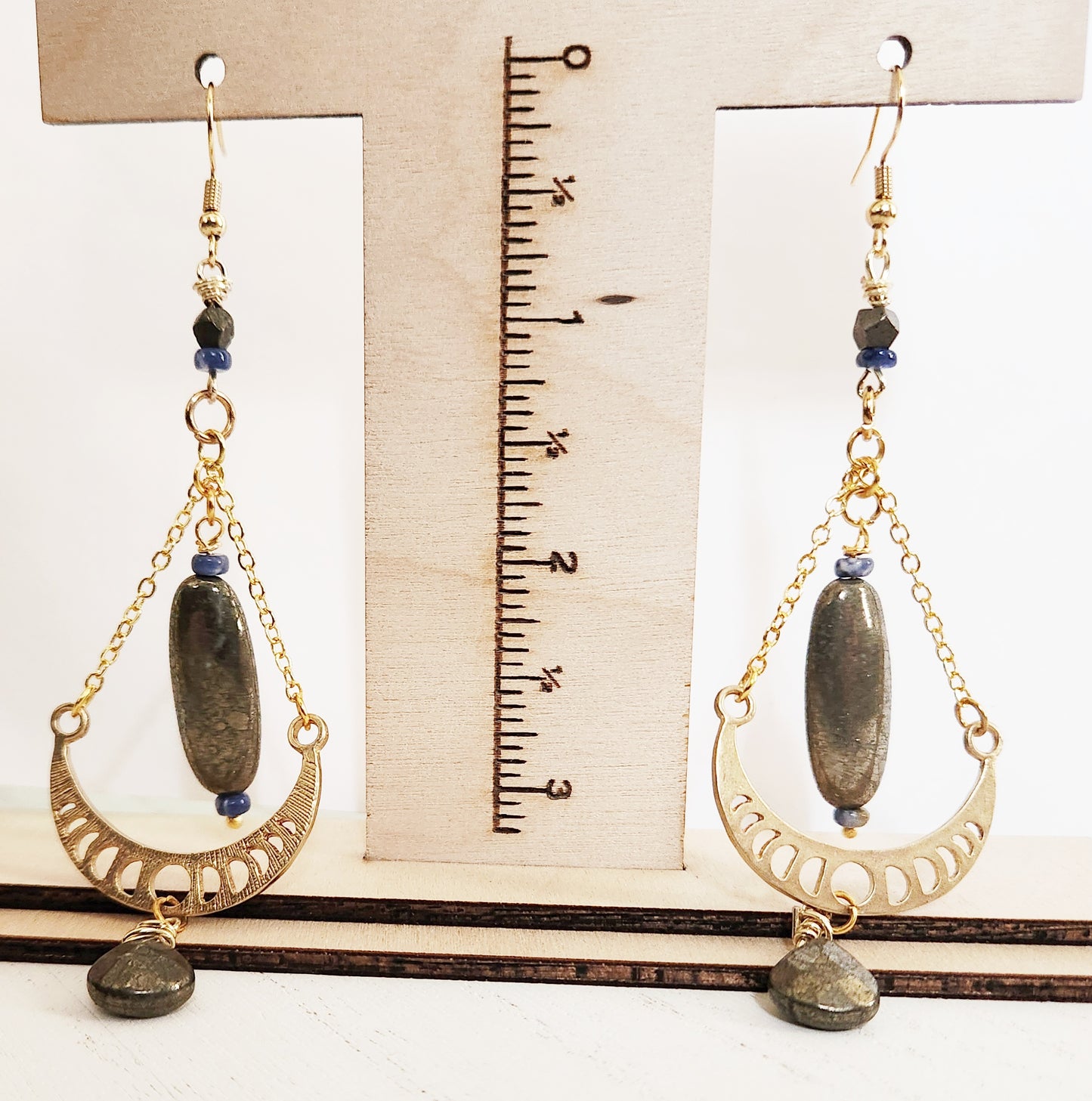 Raw brass moon phase dangle earrings with Pyrite gemstones