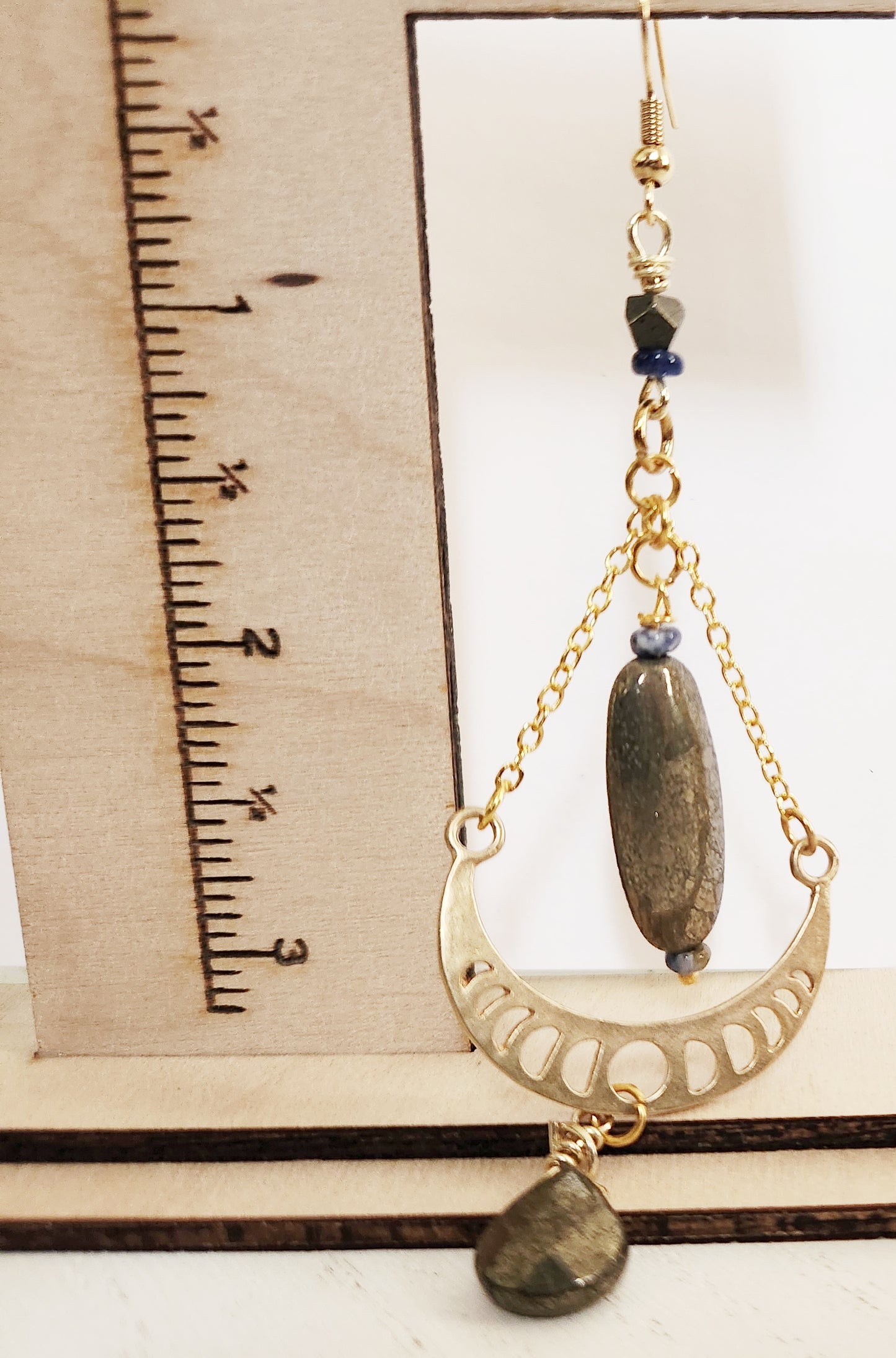 Raw brass moon phase dangle earrings with Pyrite gemstones