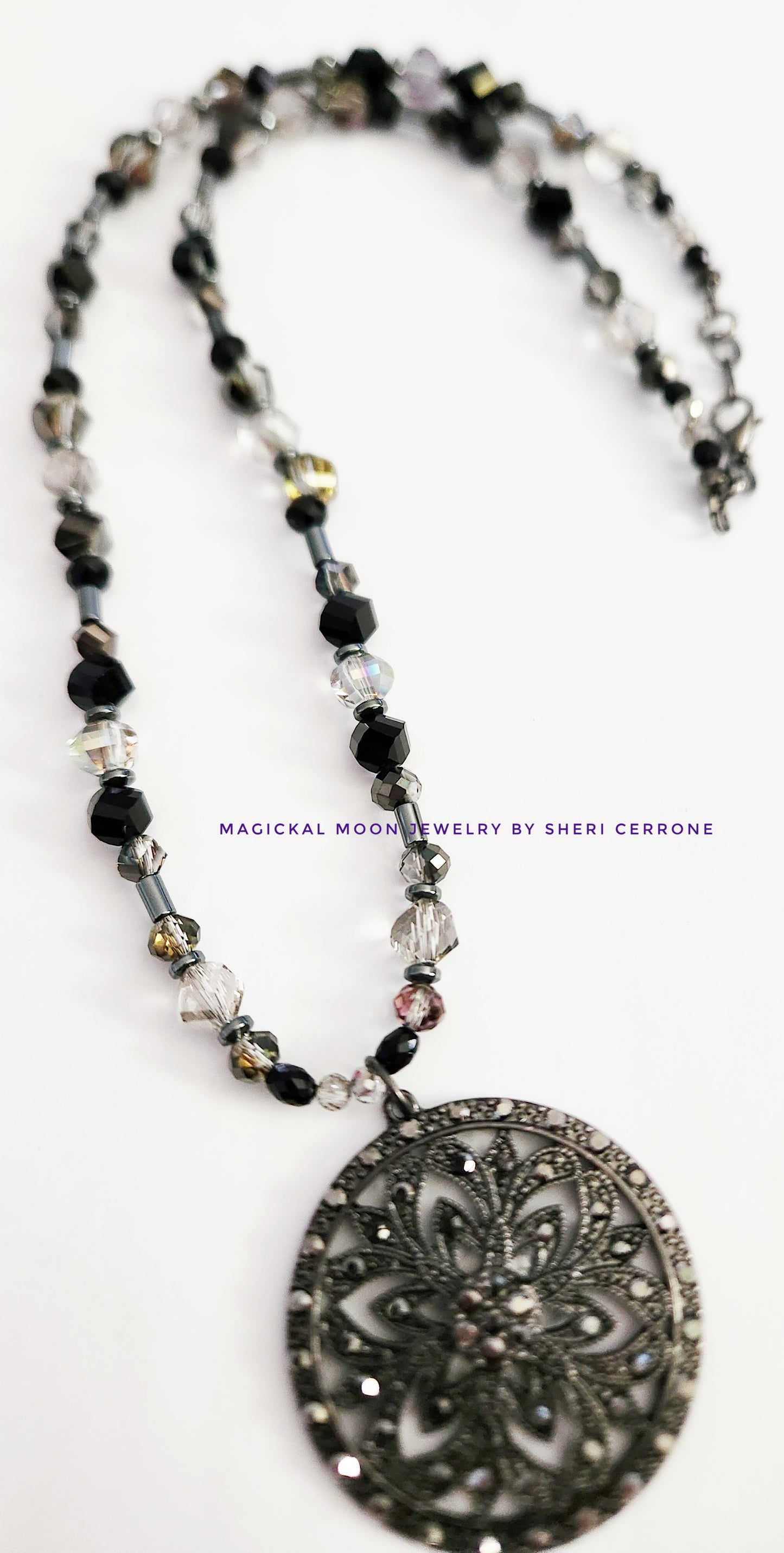 Dark metal circle necklace with Hematite gemstones