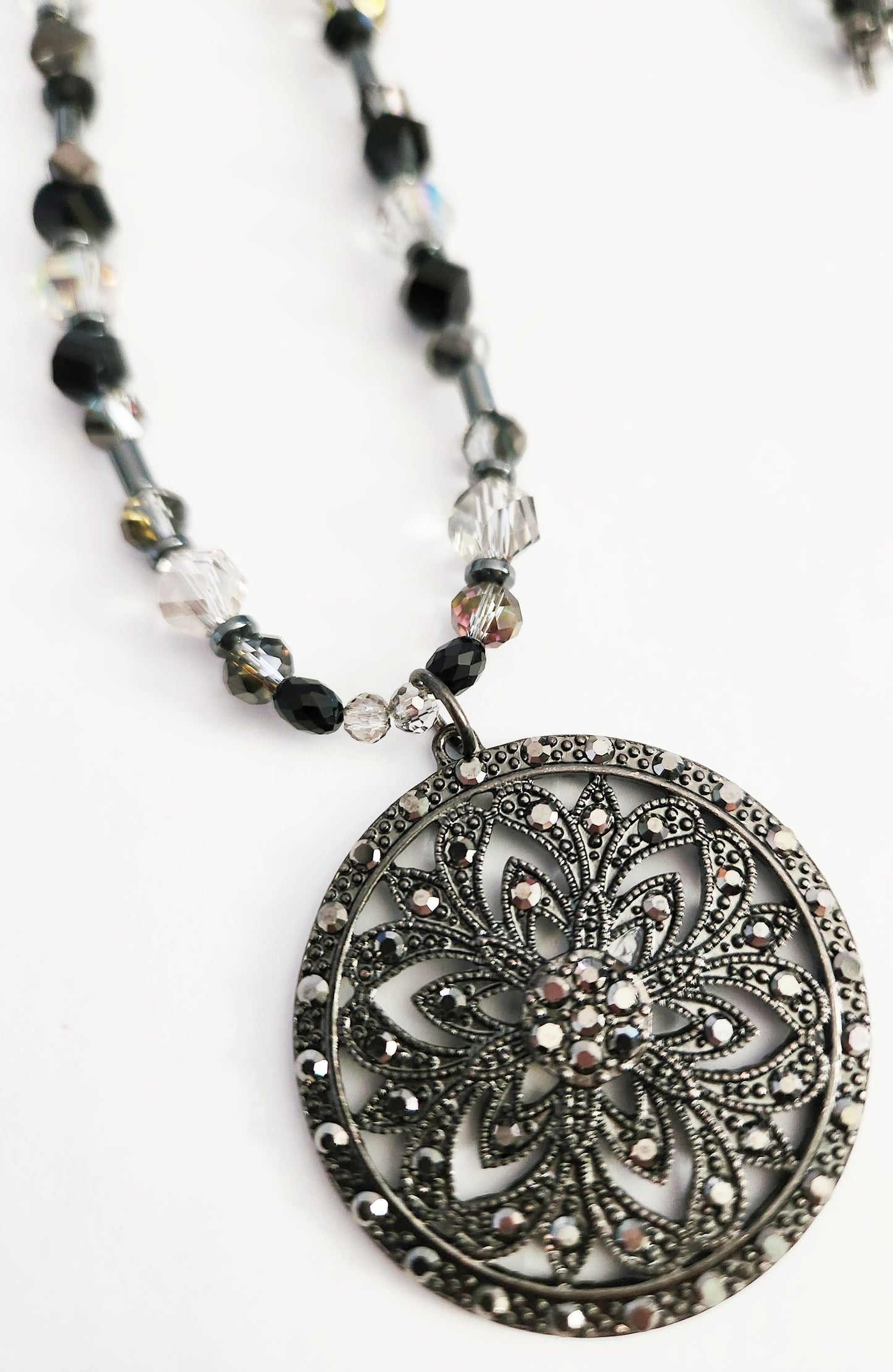 Dark metal circle necklace with Hematite gemstones