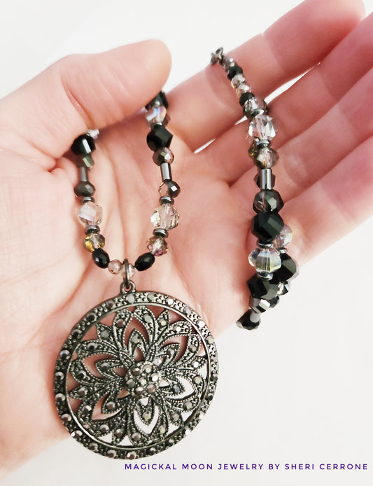 Dark metal circle necklace with Hematite gemstones