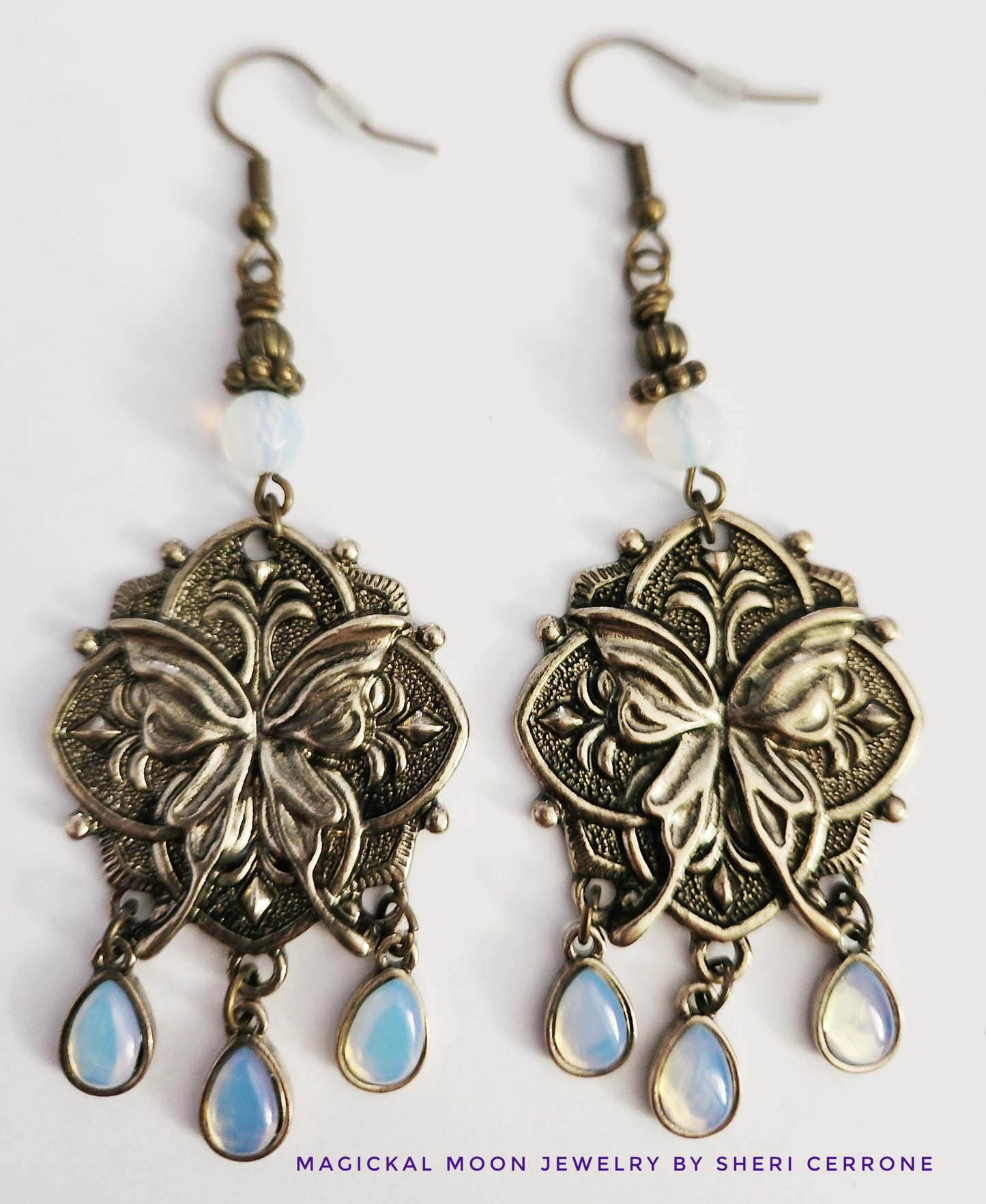 Dark gold luna moth Opalite dangle earrings