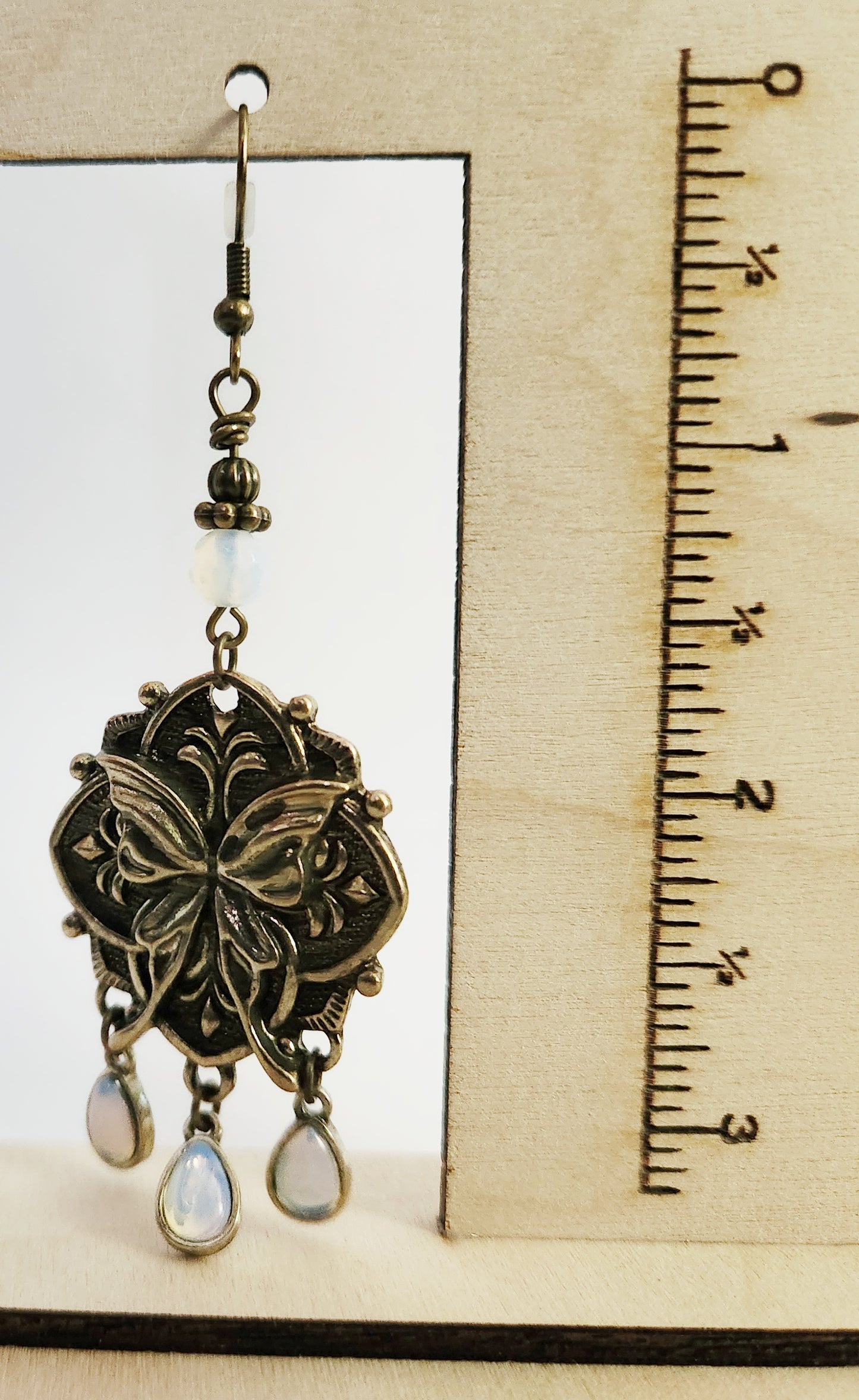 Dark gold luna moth Opalite dangle earrings
