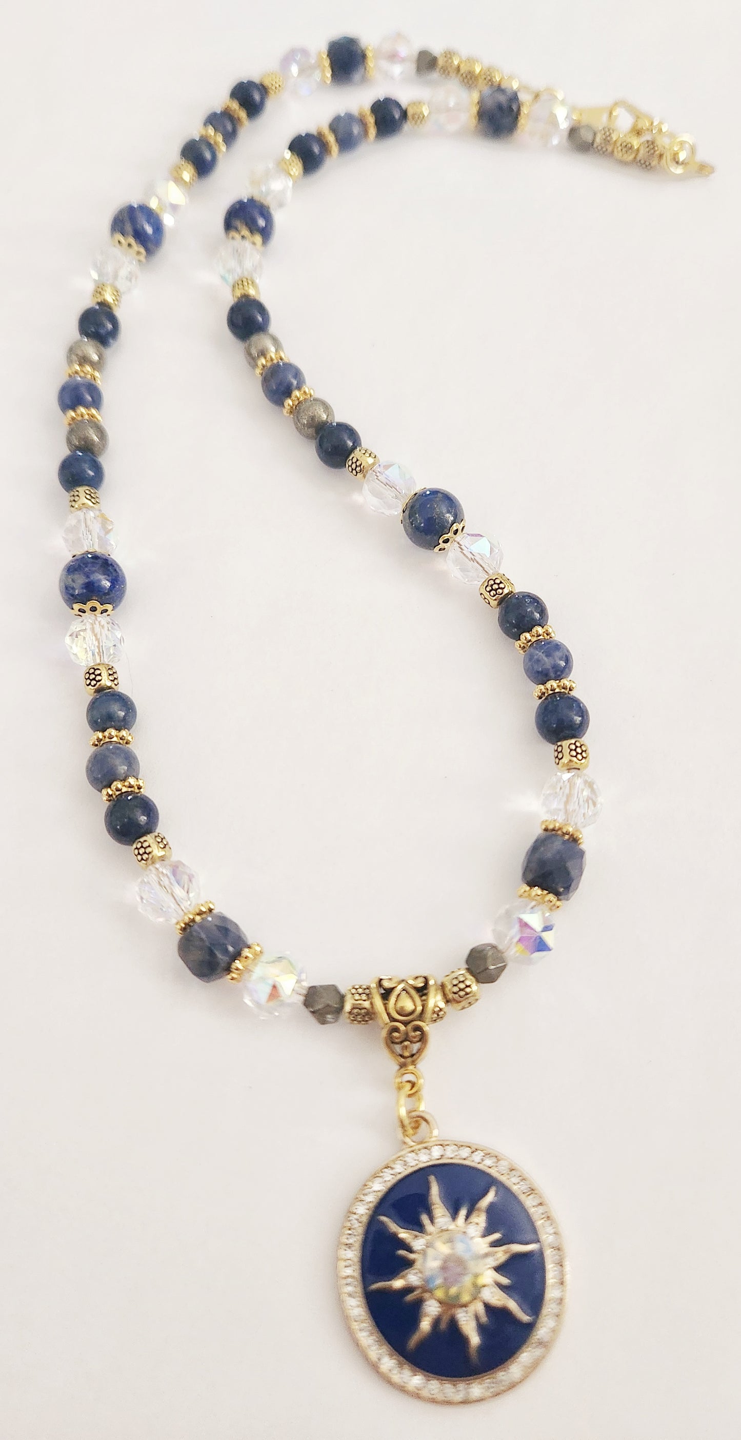 Starburst gold necklace with Lapis Lazuli and Pyrite gemstones