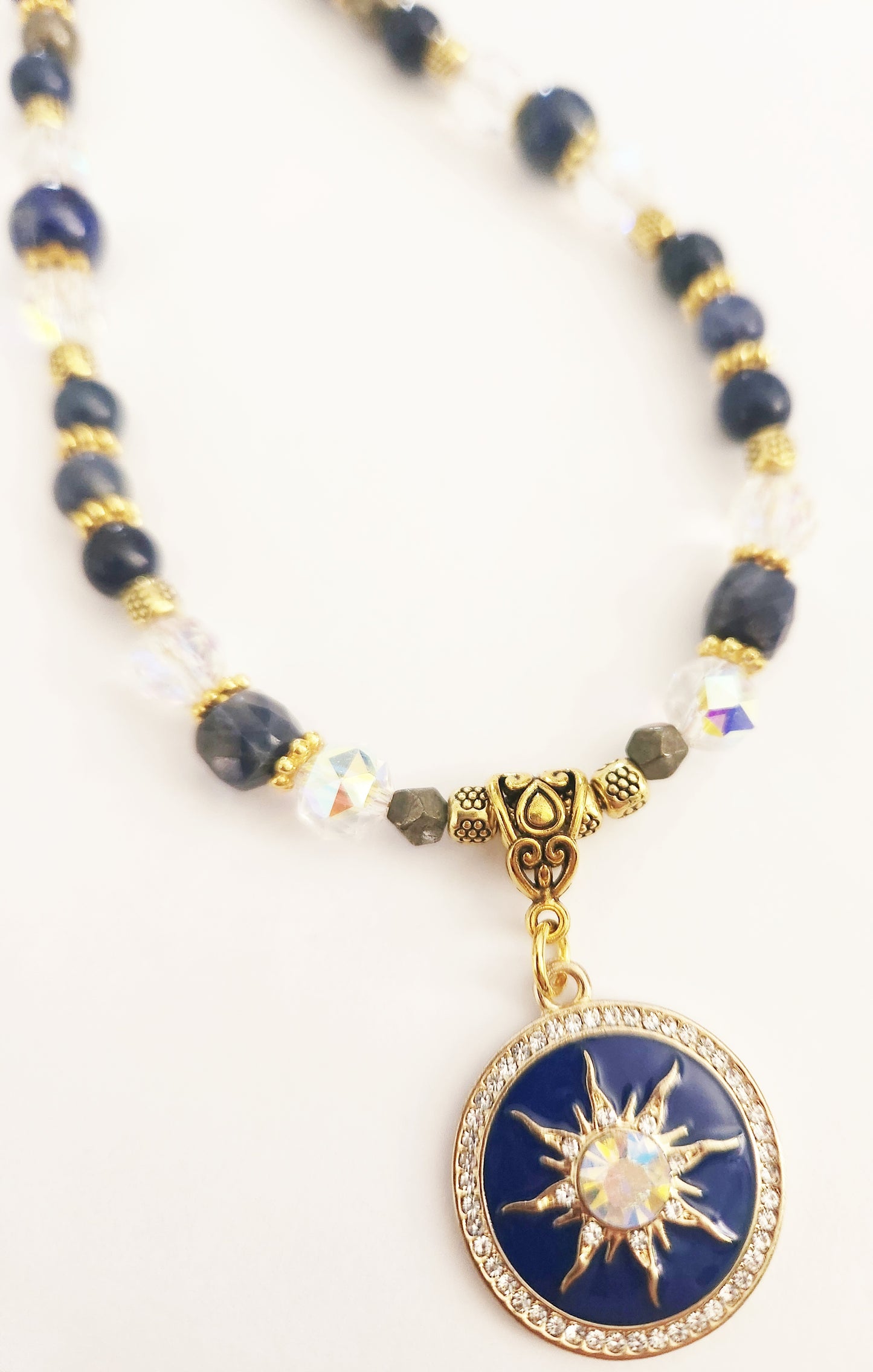 Starburst gold necklace with Lapis Lazuli and Pyrite gemstones