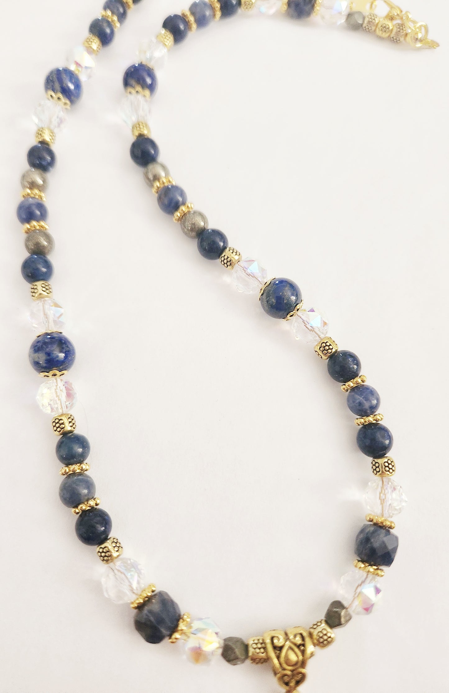 Starburst gold necklace with Lapis Lazuli and Pyrite gemstones