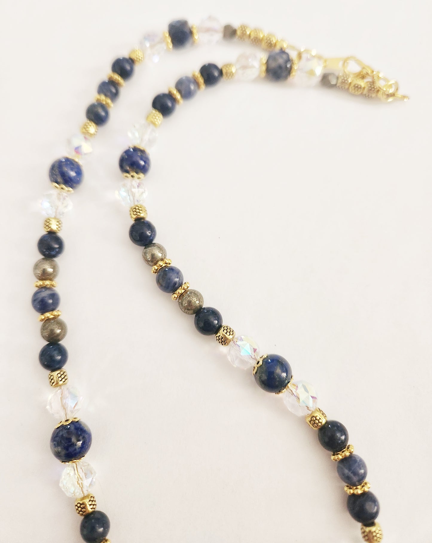 Starburst gold necklace with Lapis Lazuli and Pyrite gemstones