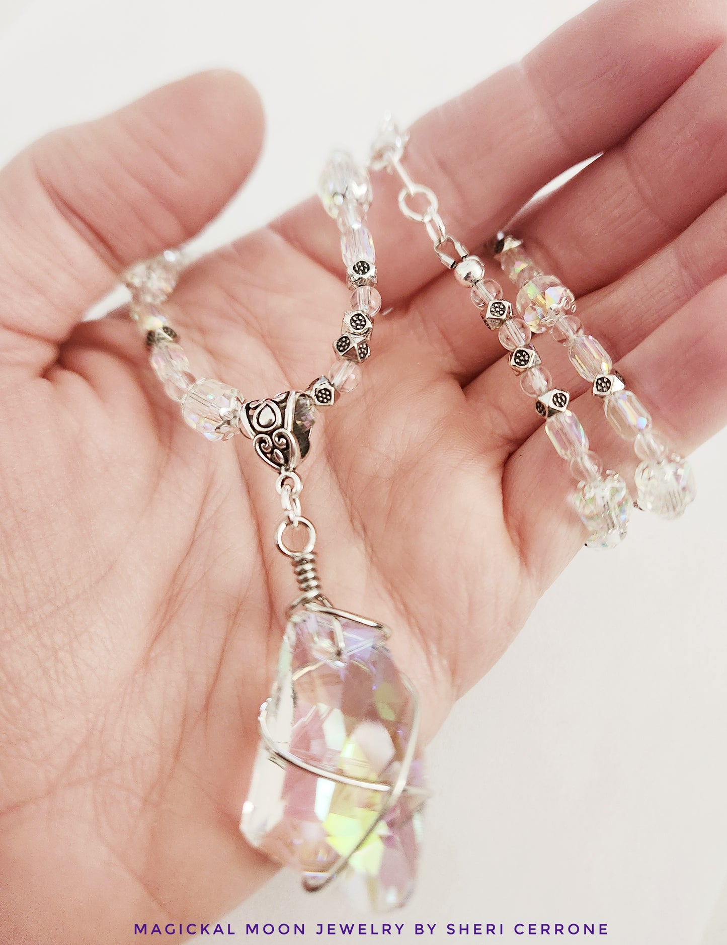 Crystal wire wrapped silver necklace with Clear Quartz gemstones