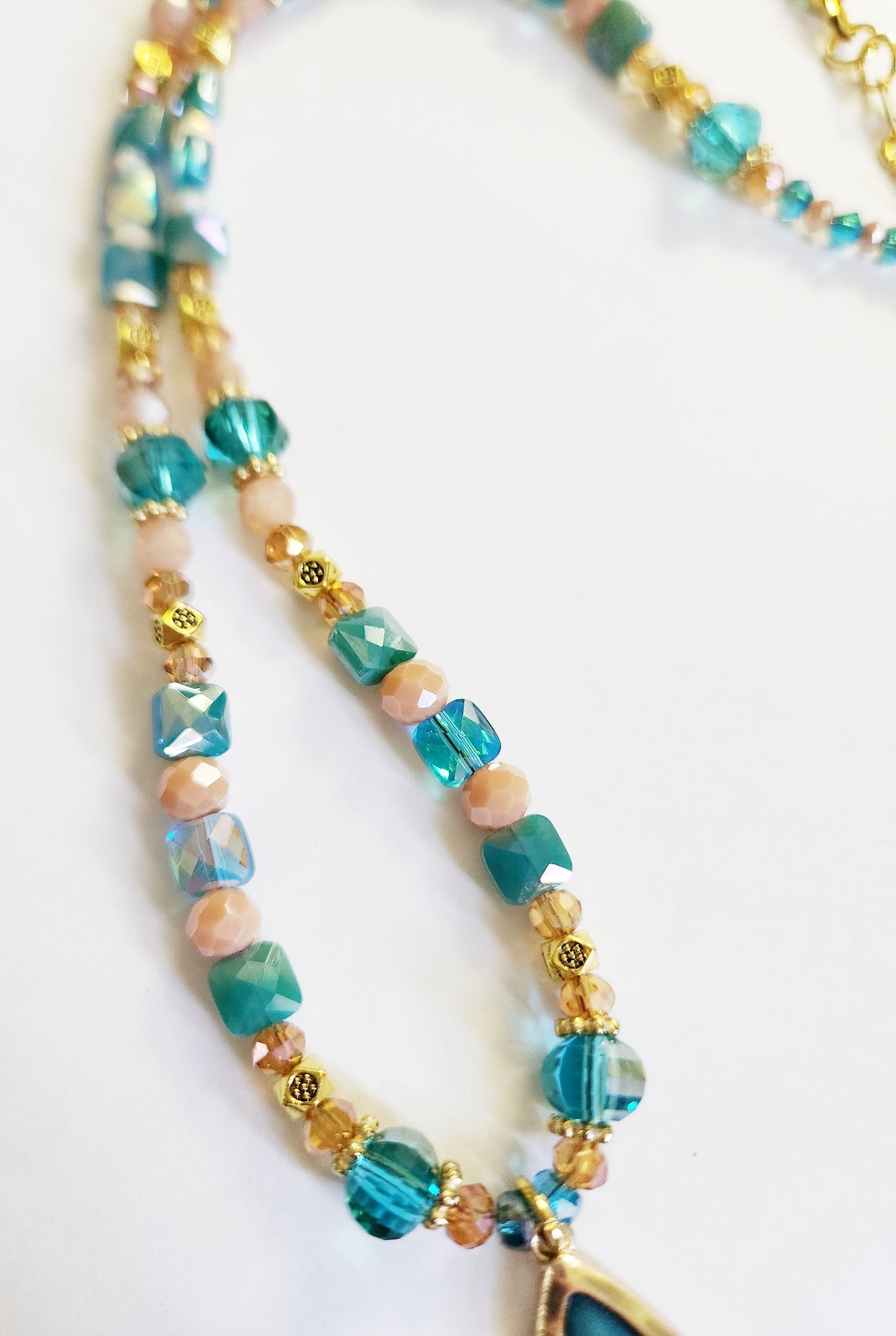 Teal green glass teardrop gold necklace