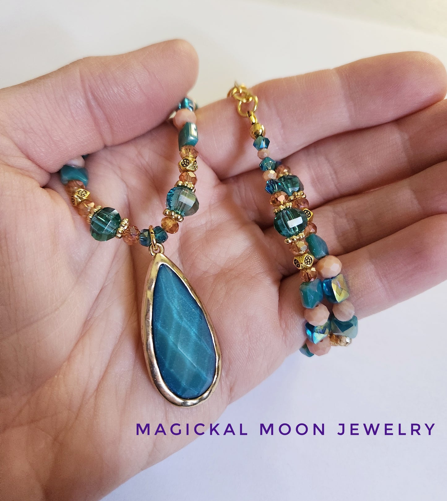 Teal green glass teardrop gold necklace