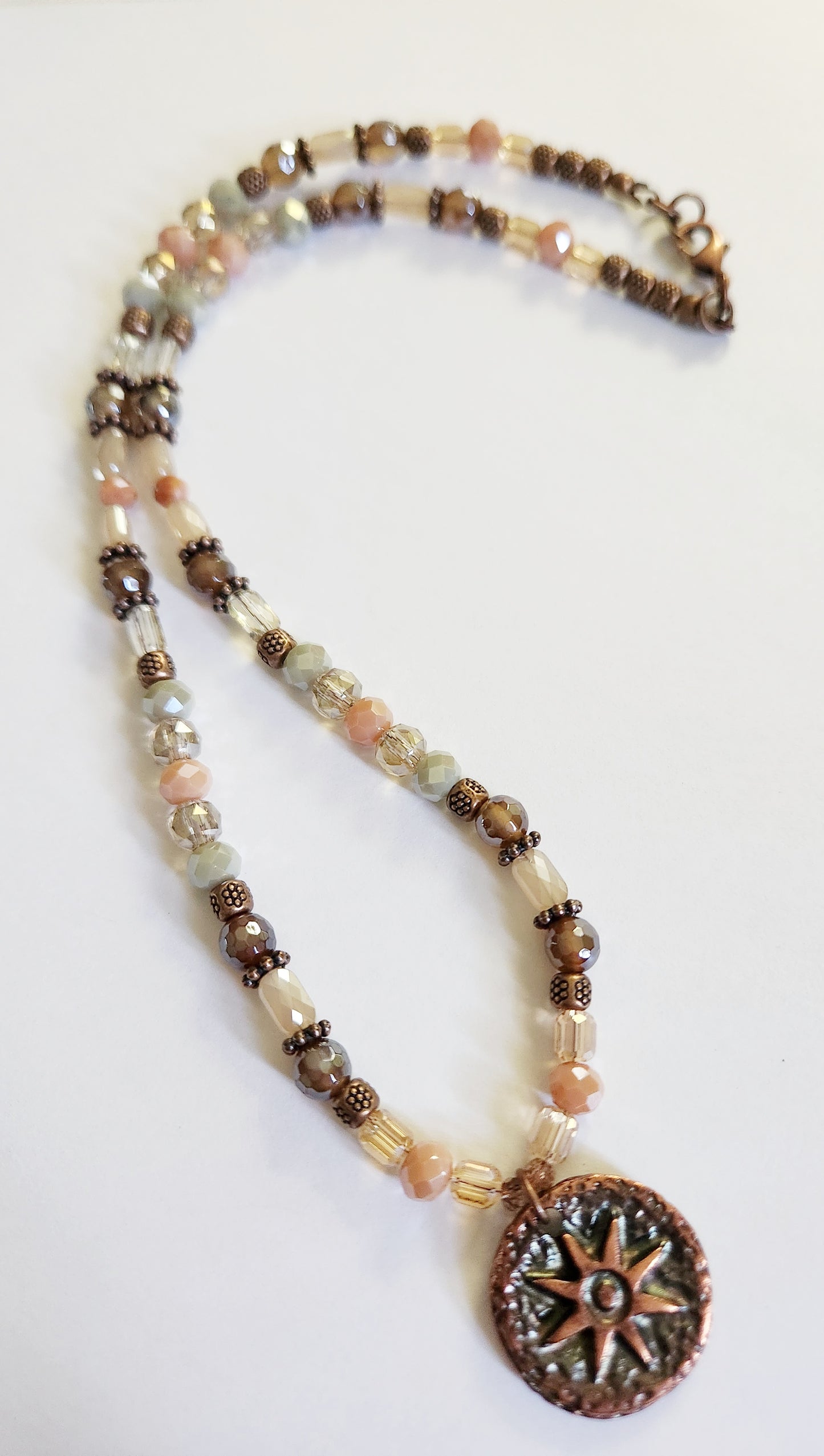 Copper sunburst circle necklace