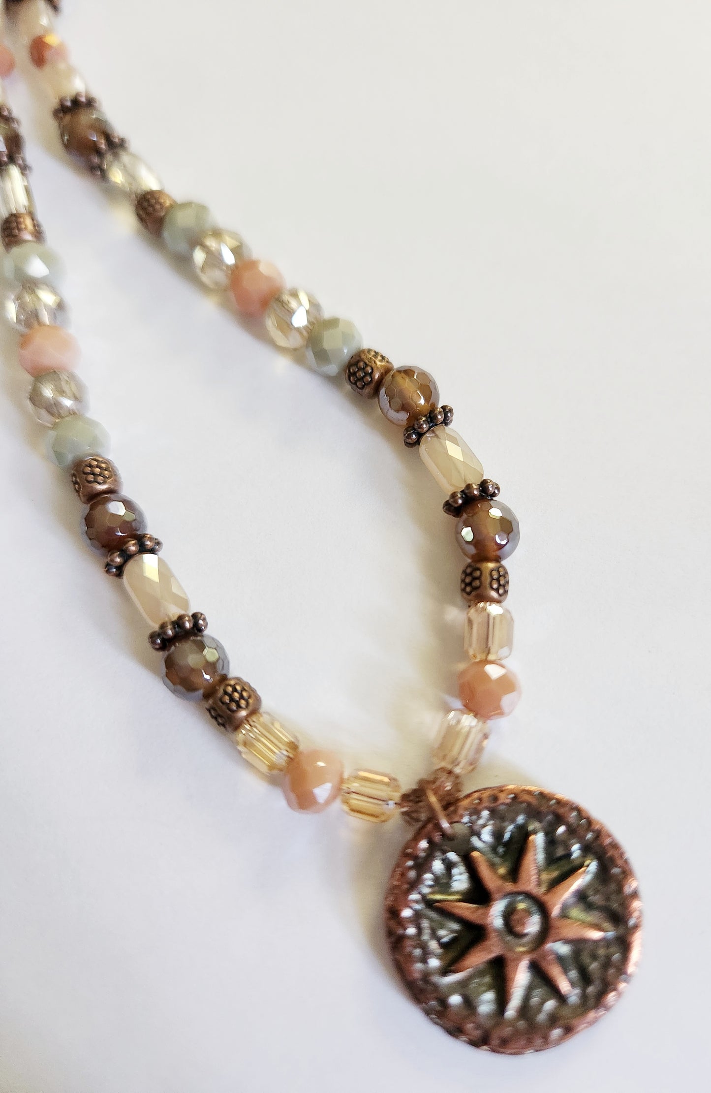 Copper sunburst circle necklace