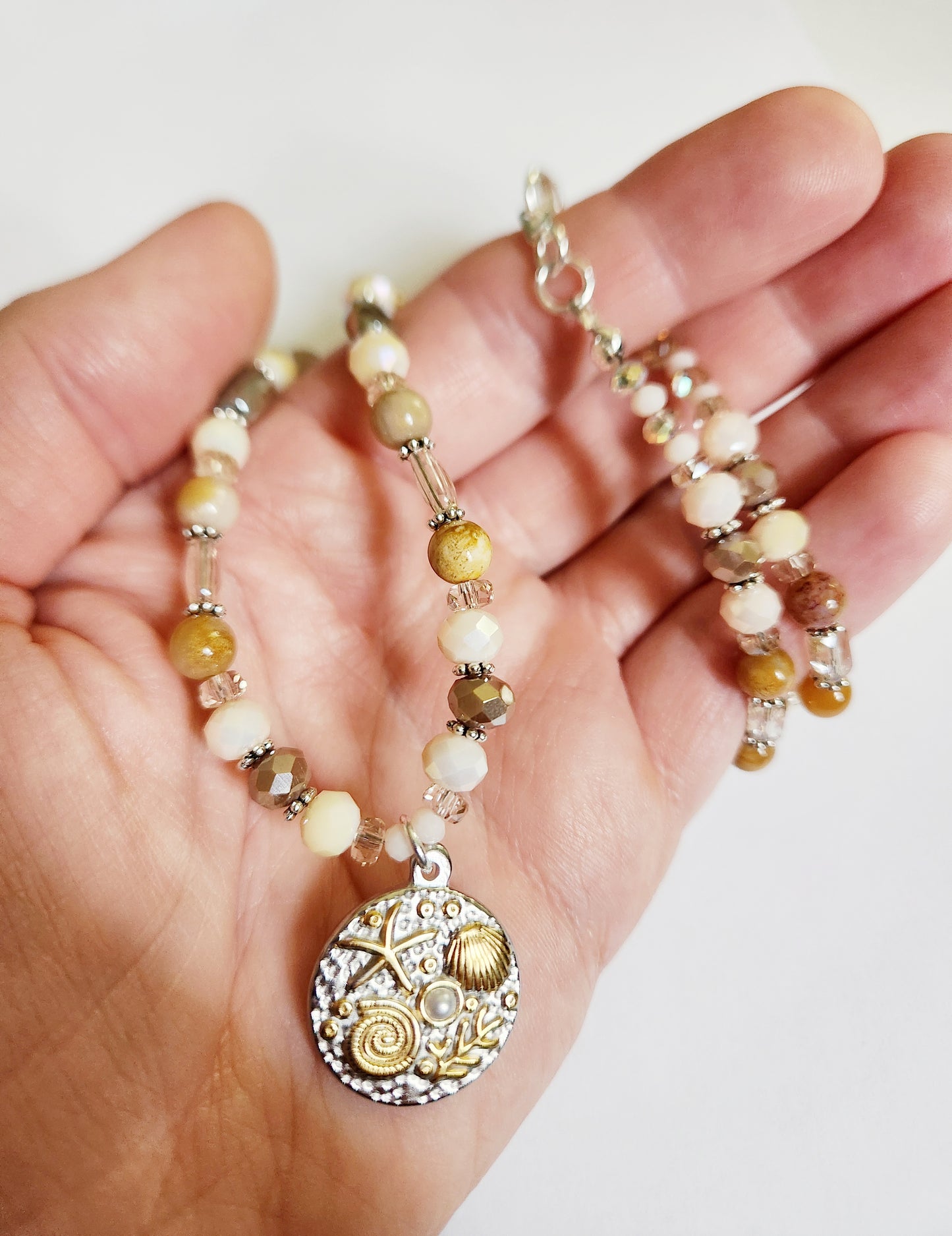 Silver gold and faux pearl circle pendant necklace