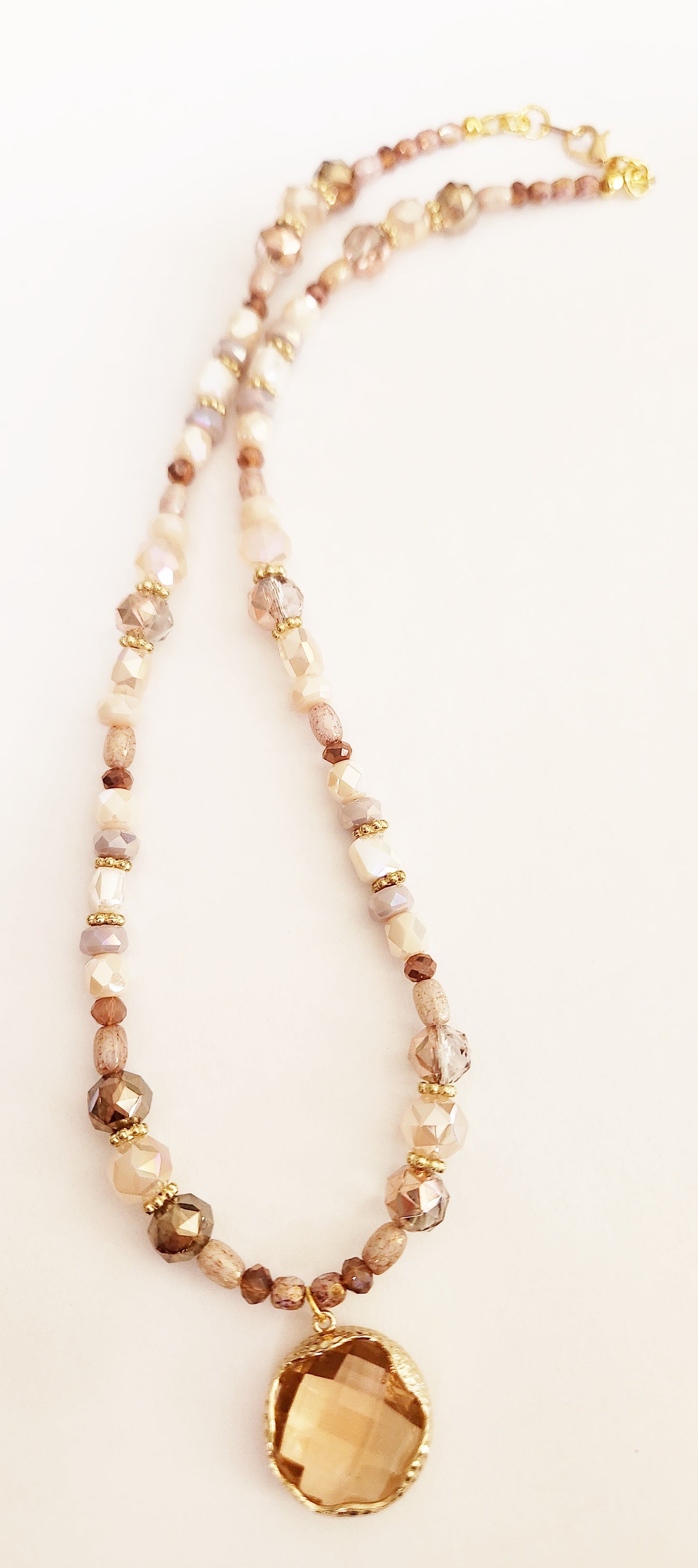 Pink glass round pendant gold necklace