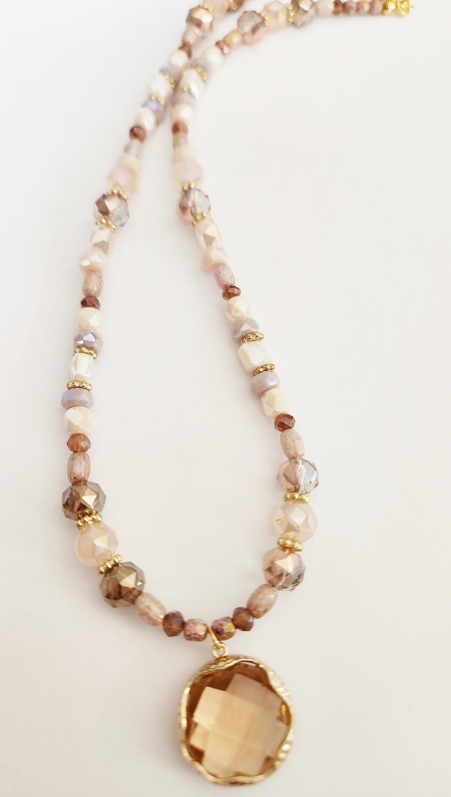 Pink glass round pendant gold necklace