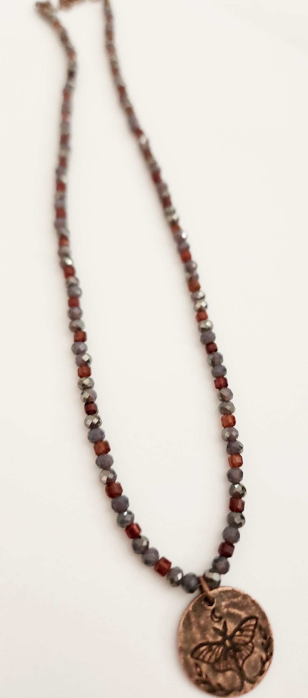 Copper luna moth circle necklace