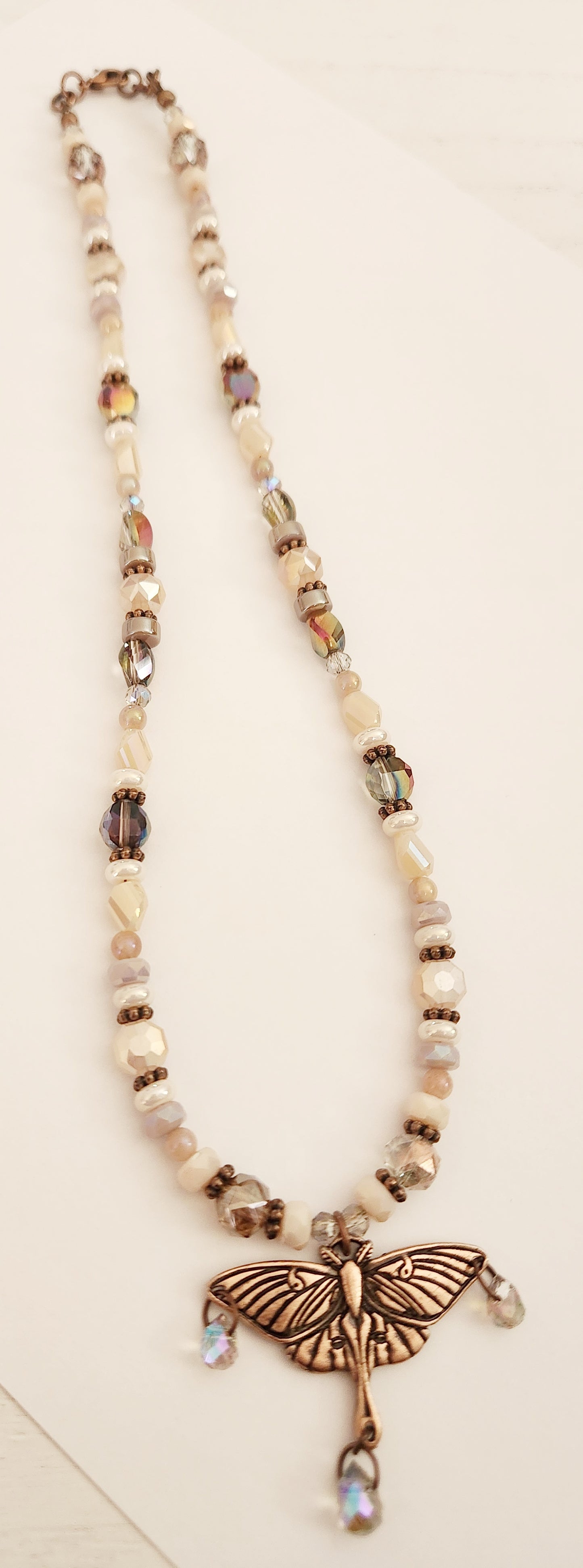 Copper luna moth Peach Moonstone necklace
