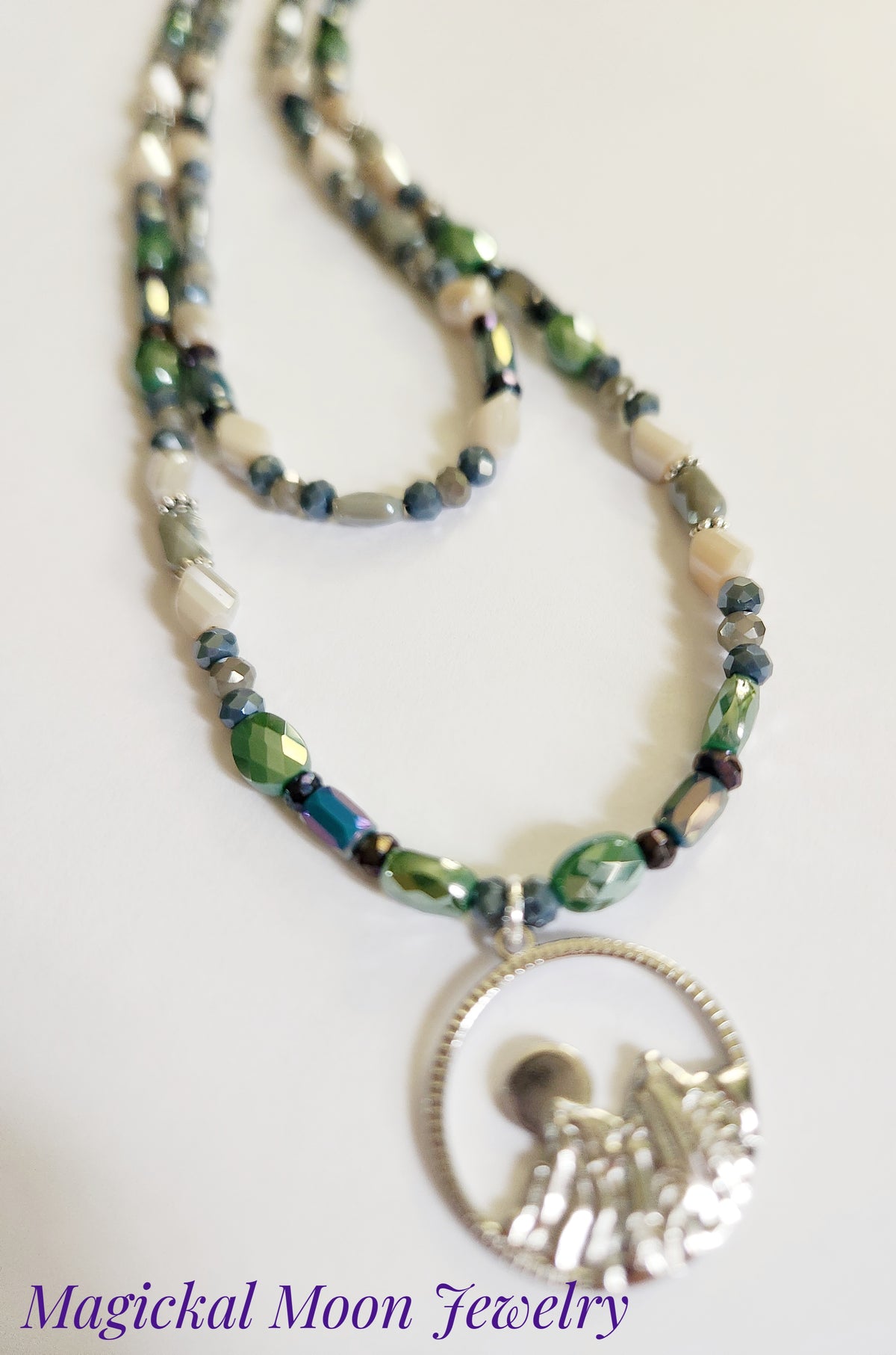 Silver mountain and moon pendant double strand necklace with Pyrite gemstones