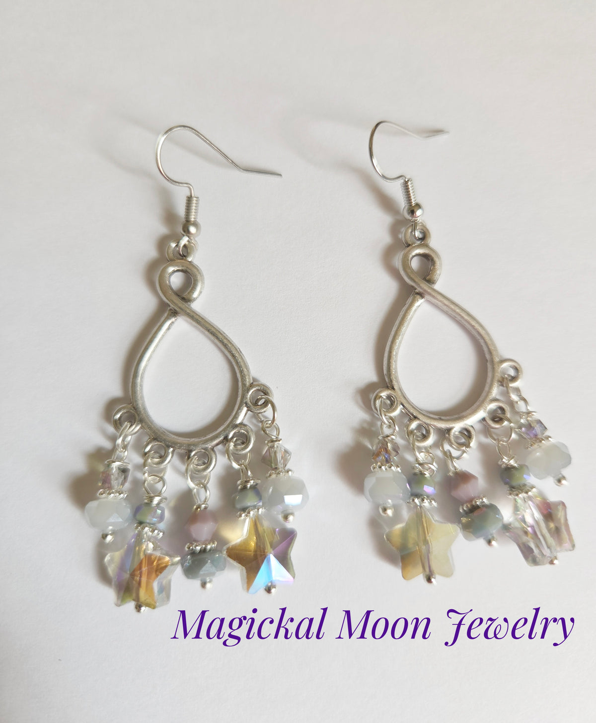 Silver teardrop beaded star chandelier earrings